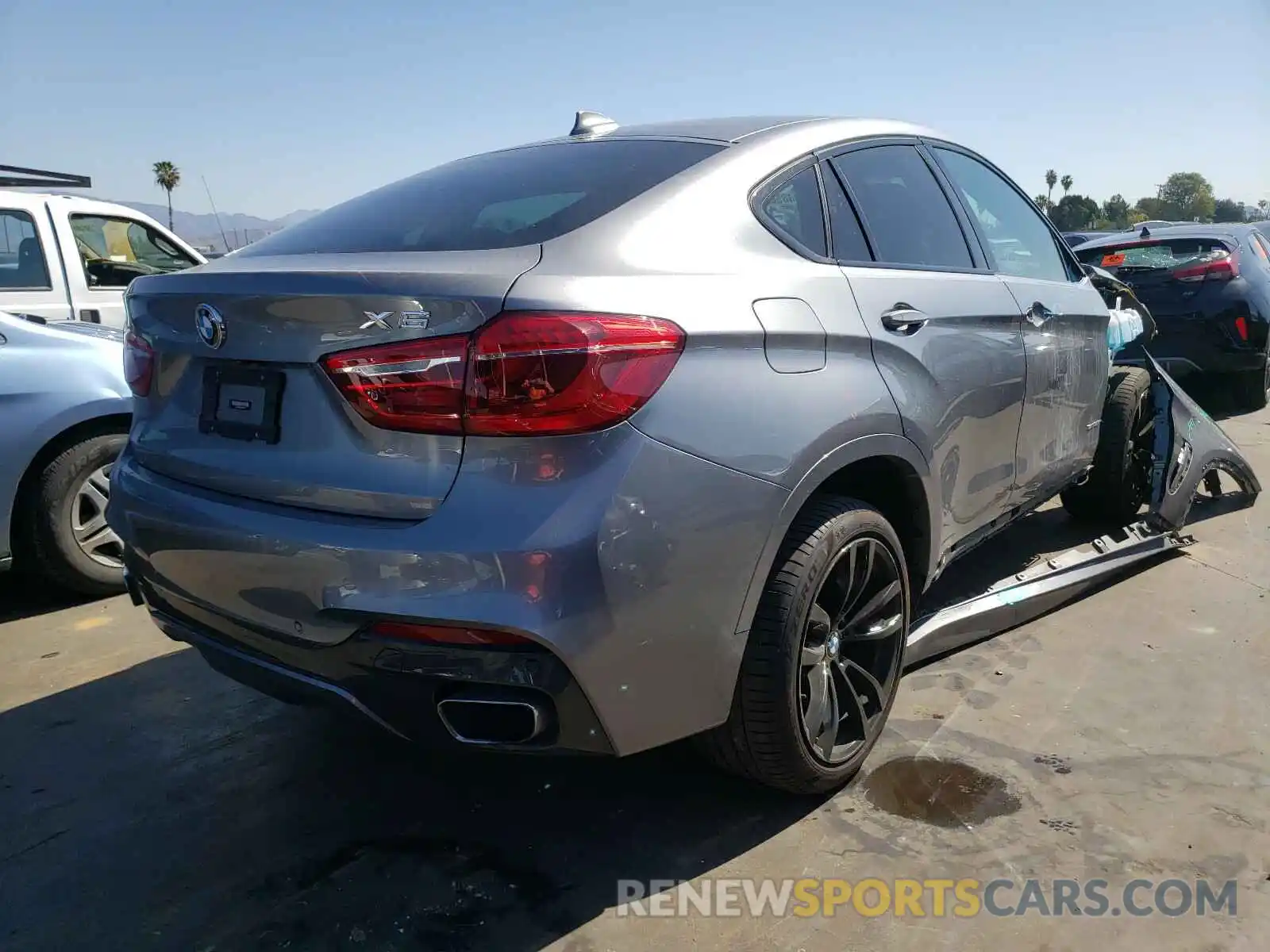 4 Photograph of a damaged car 5UXKU0C56K0H99596 BMW X6 2019