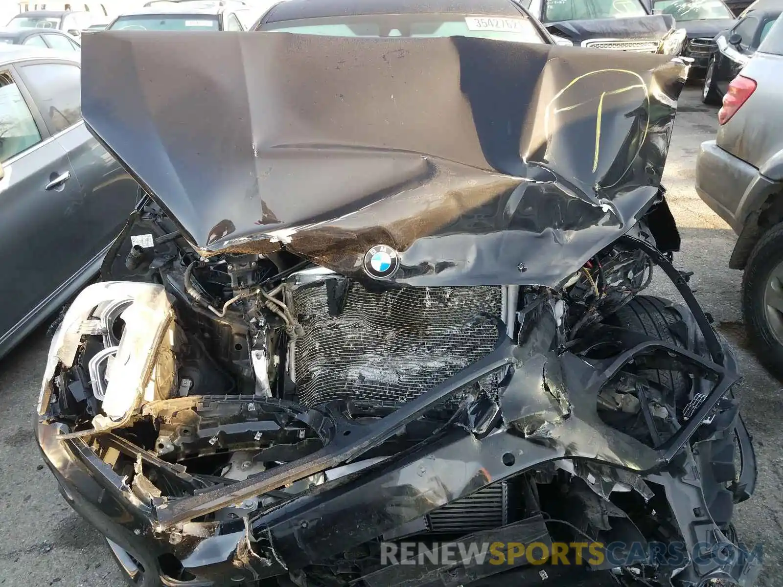 7 Photograph of a damaged car 5UXKU0C58K0S97735 BMW X6 2019