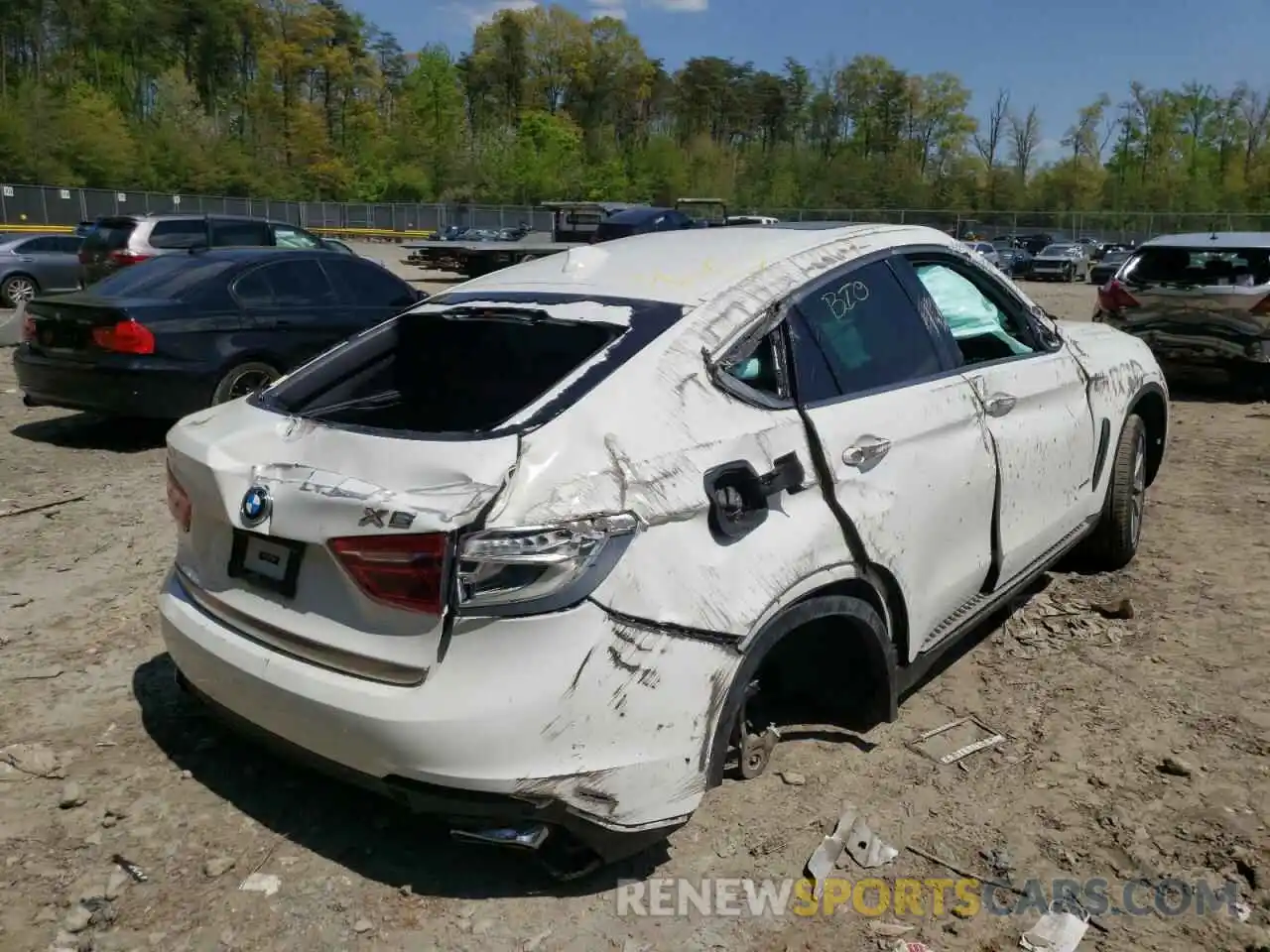 4 Photograph of a damaged car 5UXKU2C53K0Z63430 BMW X6 2019