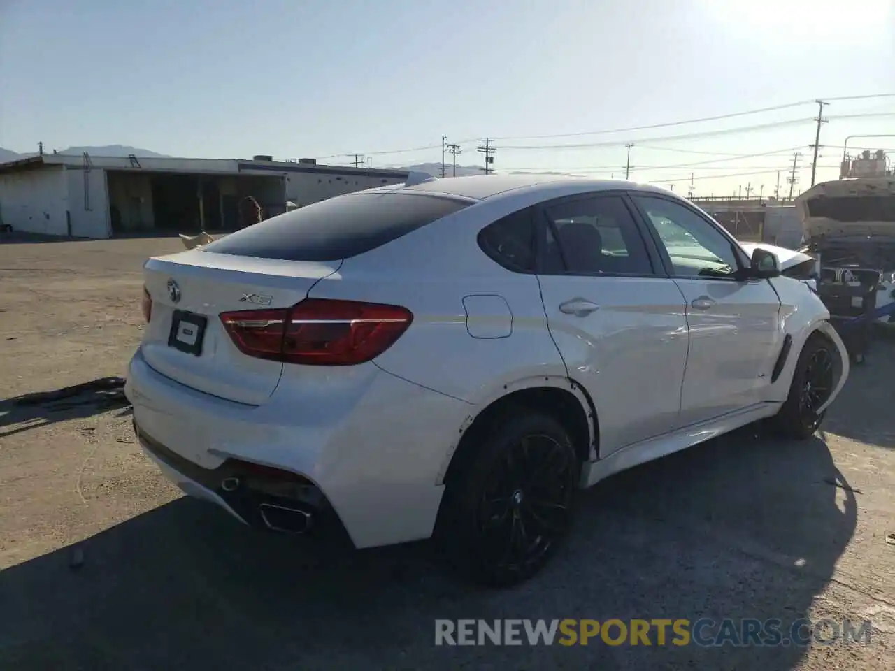 4 Photograph of a damaged car 5UXKU2C56K0Z65978 BMW X6 2019