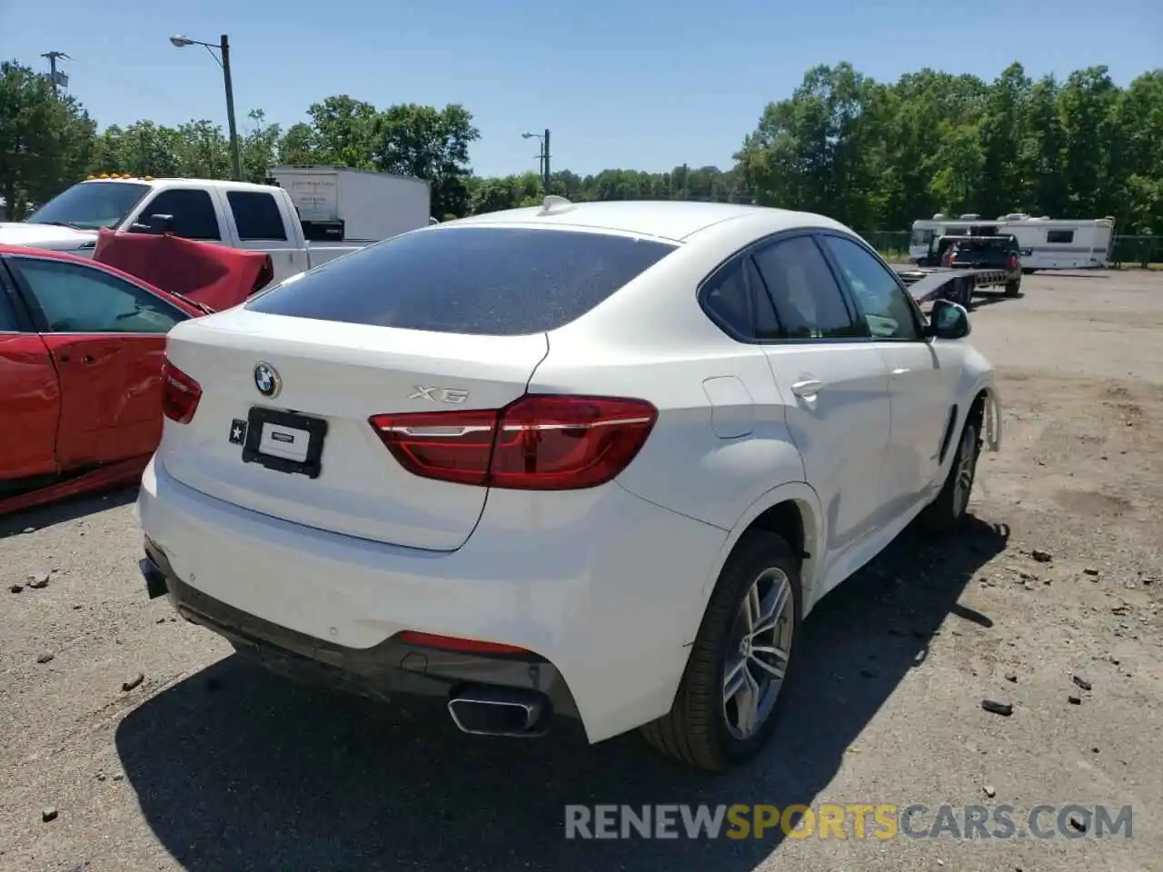 4 Photograph of a damaged car 5UXKU2C59K0Z64713 BMW X6 2019