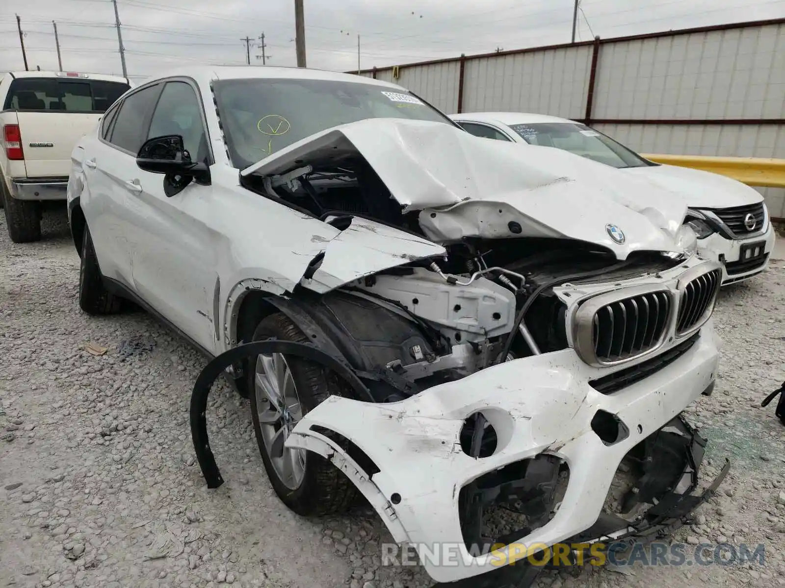 1 Photograph of a damaged car 5UXKU2C5XK0Z65451 BMW X6 2019