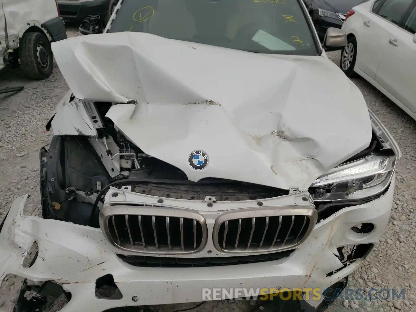 7 Photograph of a damaged car 5UXKU2C5XK0Z65451 BMW X6 2019