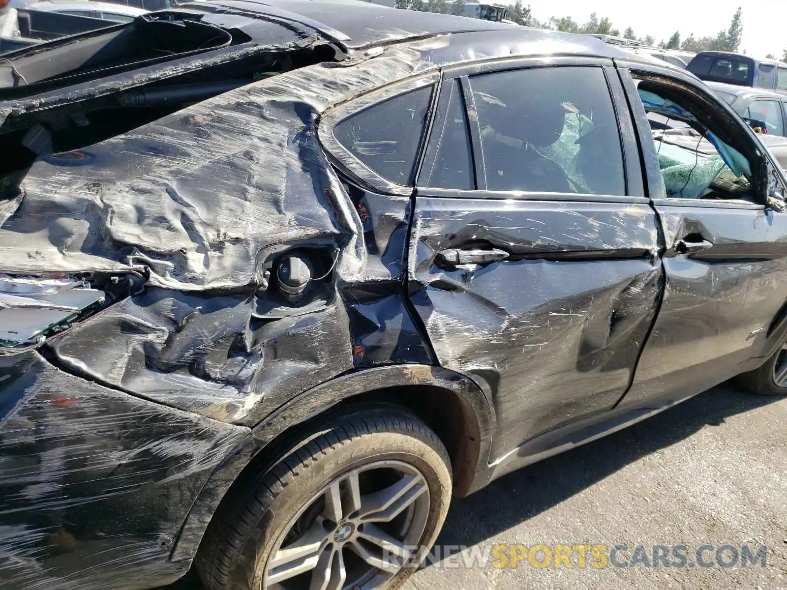 10 Photograph of a damaged car 5UXKU2C5XK0Z65501 BMW X6 2019