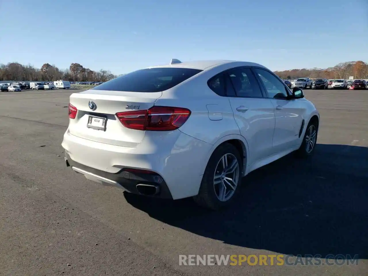 4 Photograph of a damaged car 5UXKU6C59KLP60595 BMW X6 2019