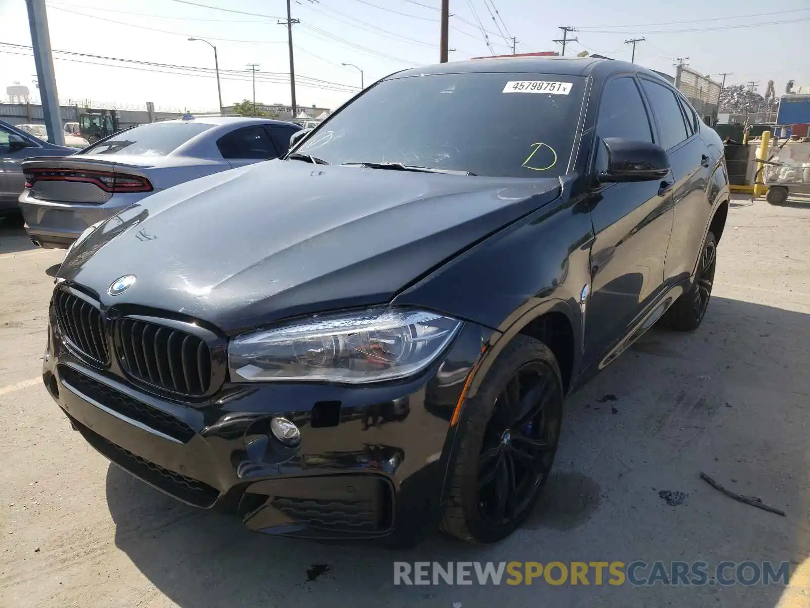 2 Photograph of a damaged car 5YMKW8C53K0Y74916 BMW X6 2019