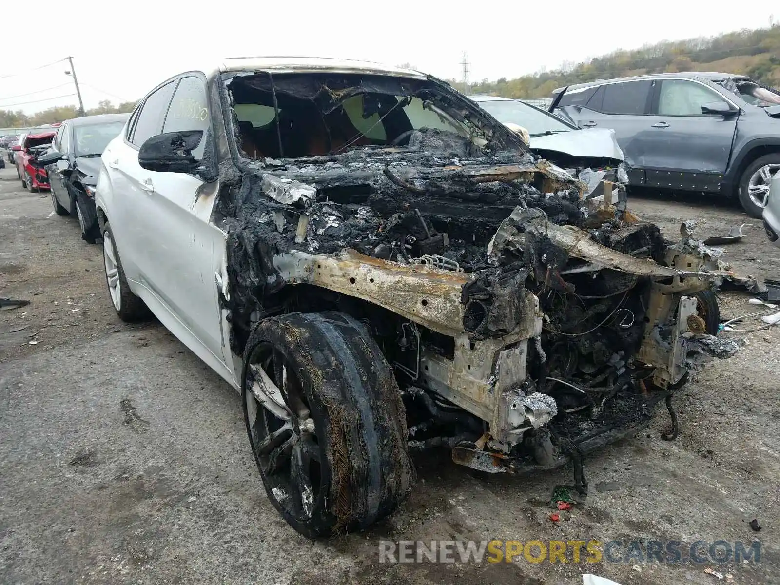 1 Photograph of a damaged car 5YMKW8C5XK0Y74976 BMW X6 2019