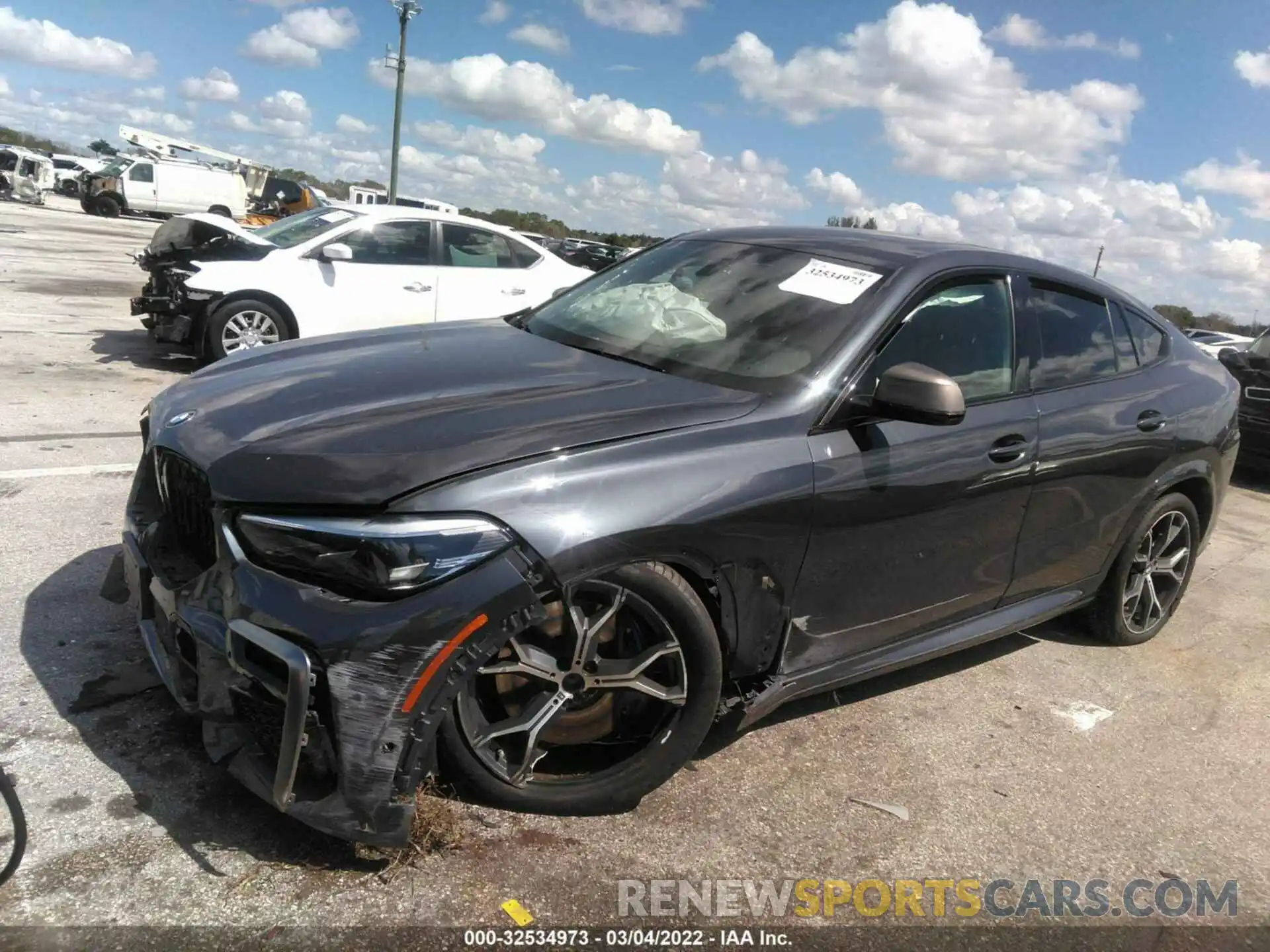 2 Photograph of a damaged car 5UXCY8C00L9B31043 BMW X6 2020