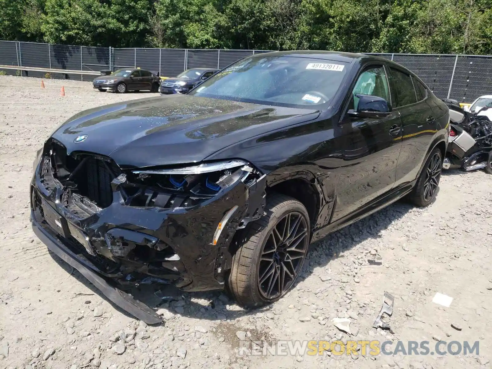 2 Photograph of a damaged car 5YMCY0C04L9D55619 BMW X6 2020