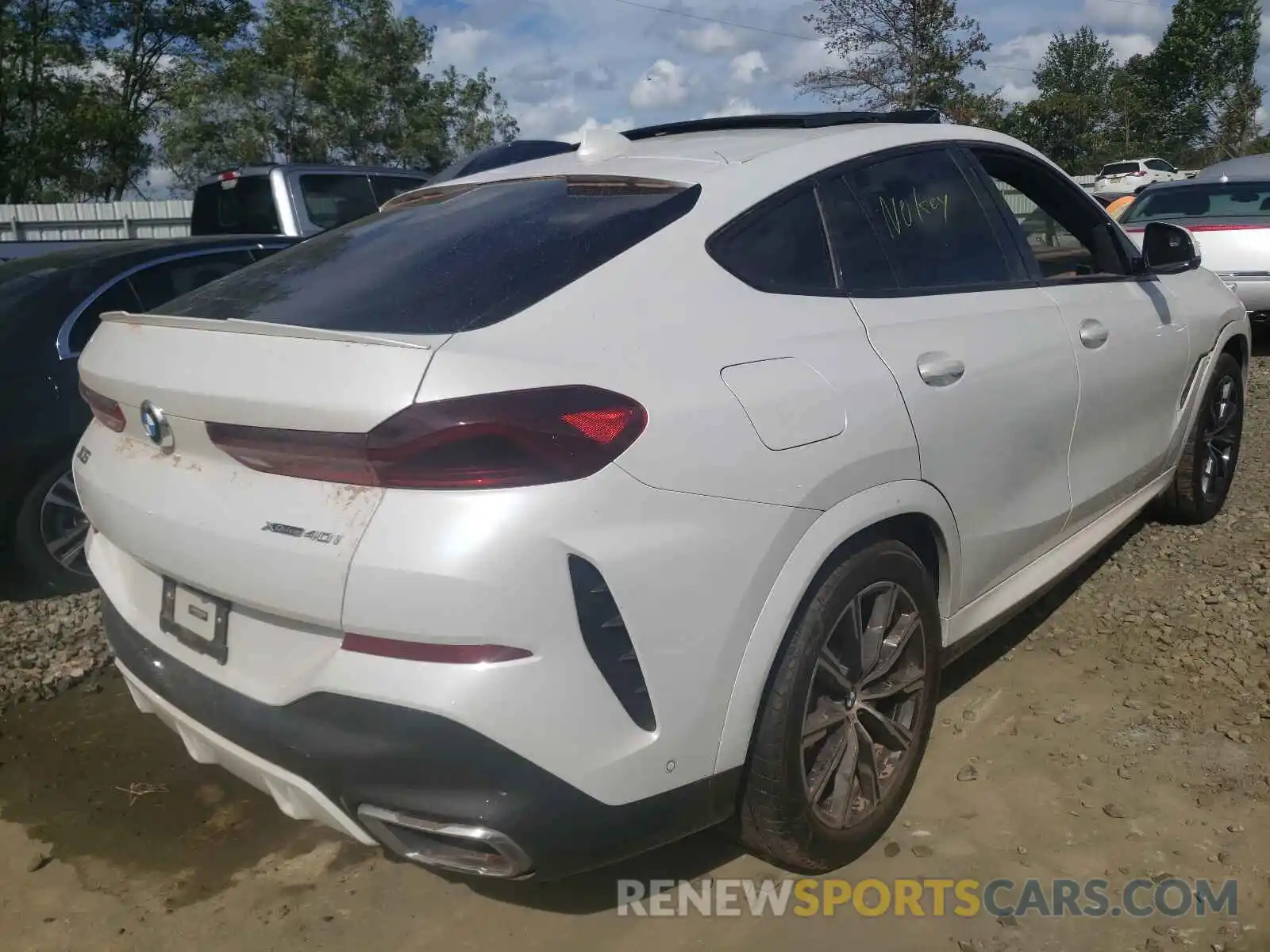 4 Photograph of a damaged car 5UXCY6C03M9E08225 BMW X6 2021