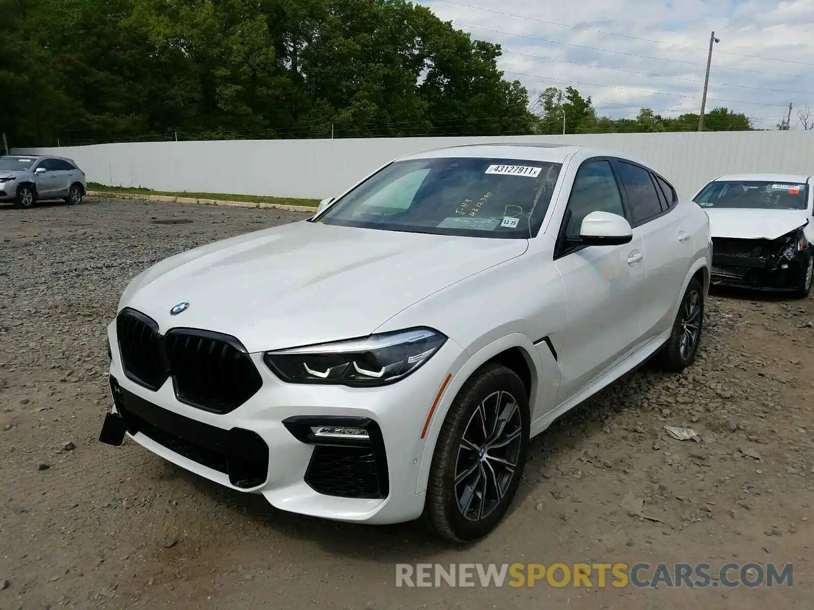 2 Photograph of a damaged car 5UXCY6C08M9F19272 BMW X6 2021