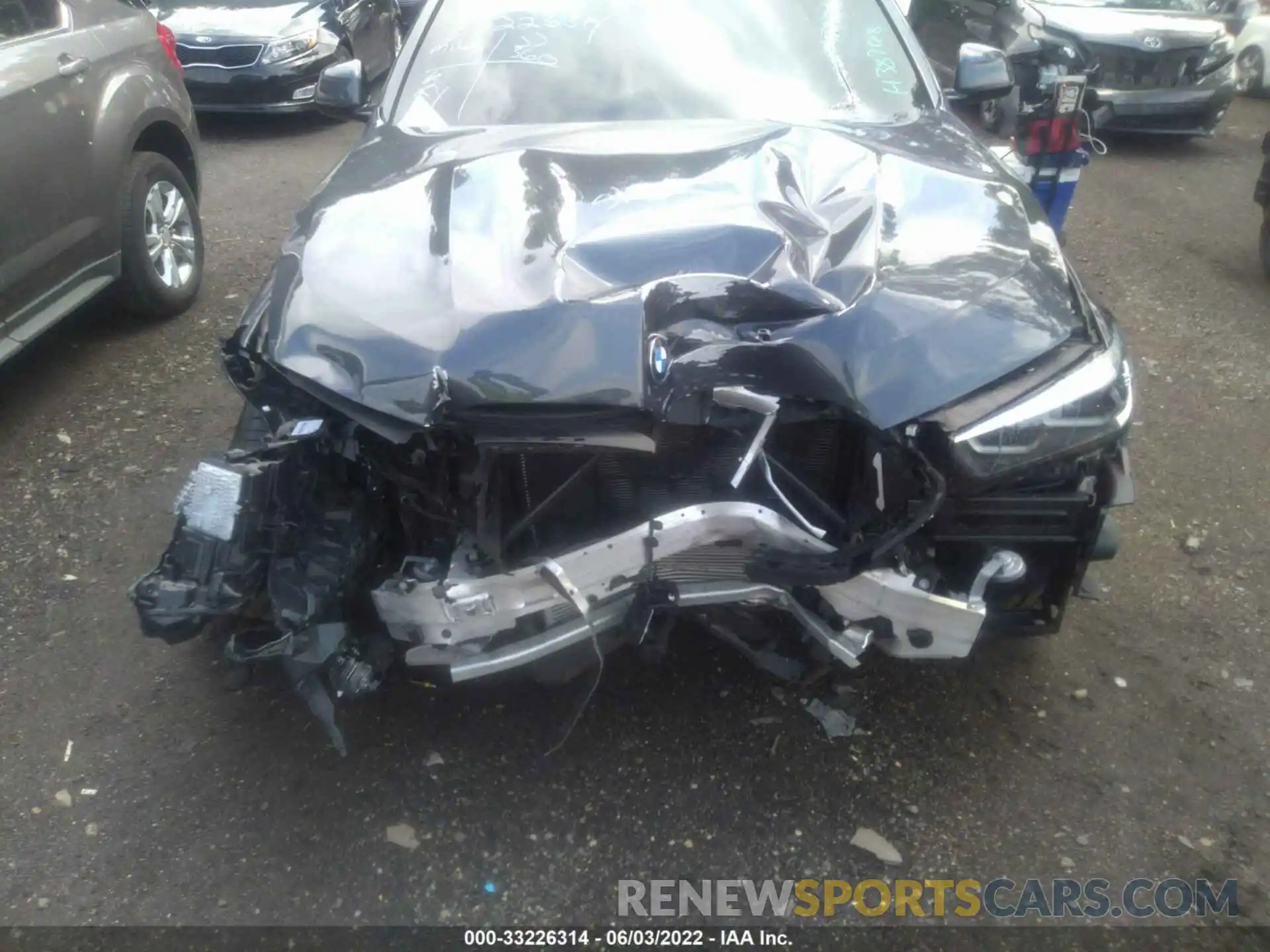 10 Photograph of a damaged car 5UXCY6C08M9H38748 BMW X6 2021