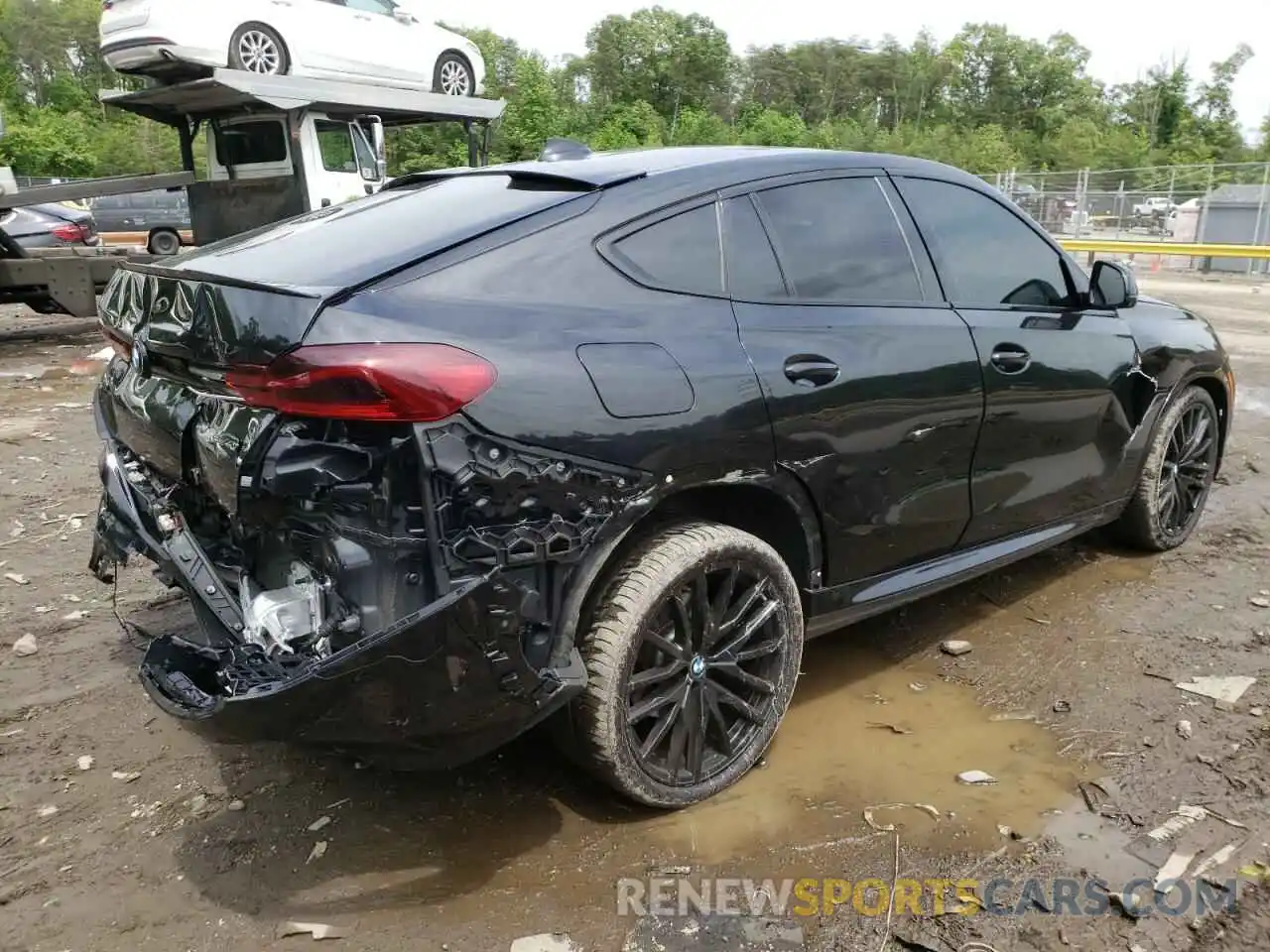 4 Photograph of a damaged car 5UXCY6C00N9K47475 BMW X6 2022