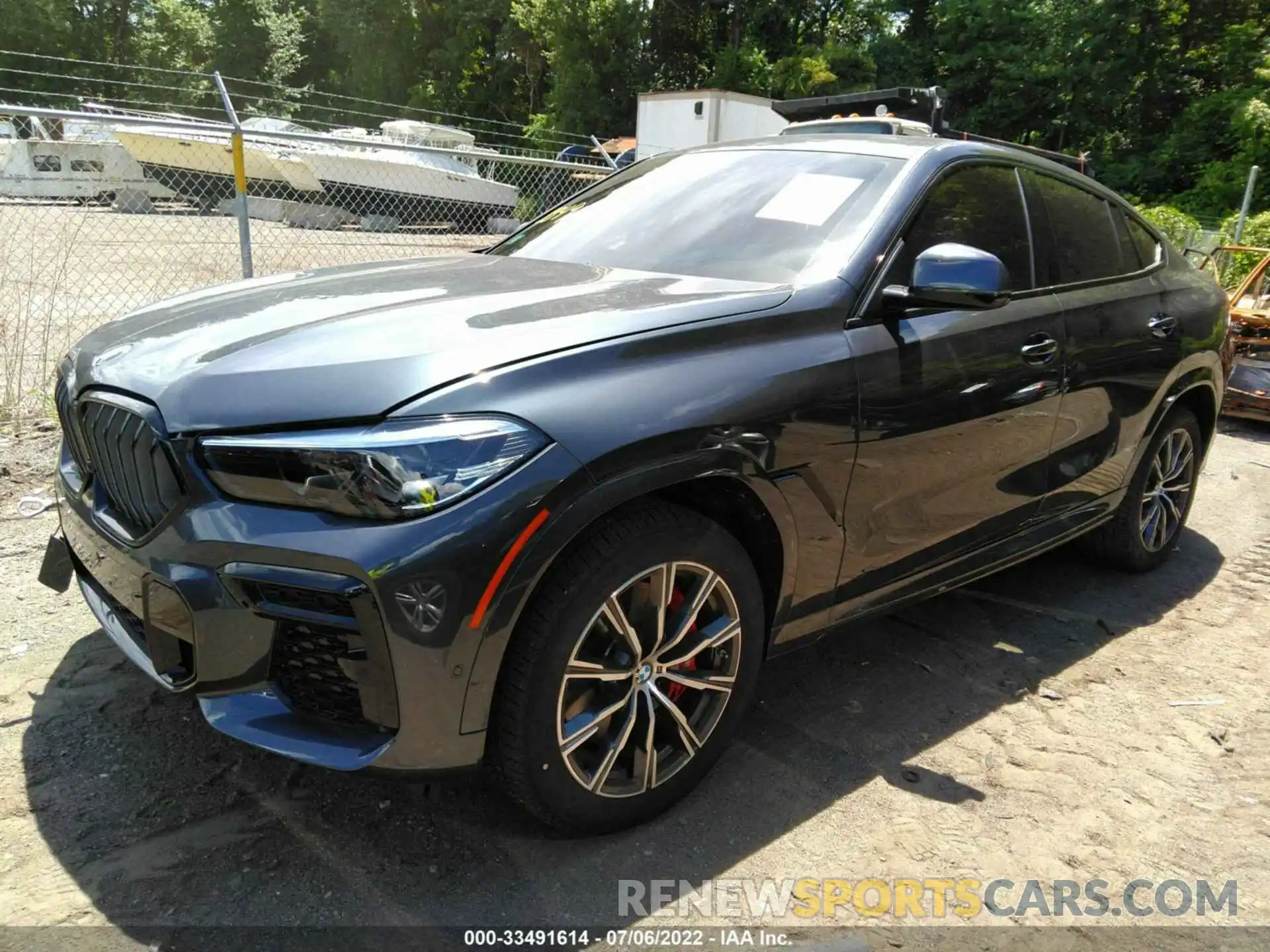 2 Photograph of a damaged car 5UXCY6C01N9K79447 BMW X6 2022