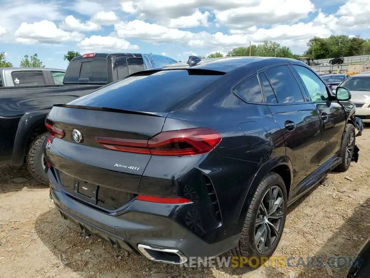 4 Photograph of a damaged car 5UXCY6C02N9L85387 BMW X6 2022