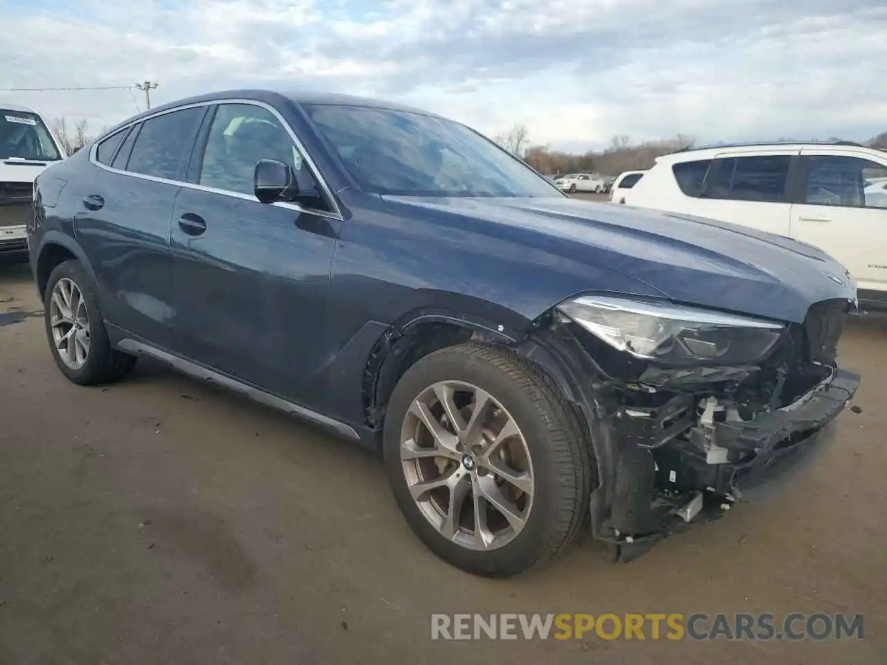 4 Photograph of a damaged car 5UXCY6C05N9K39744 BMW X6 2022