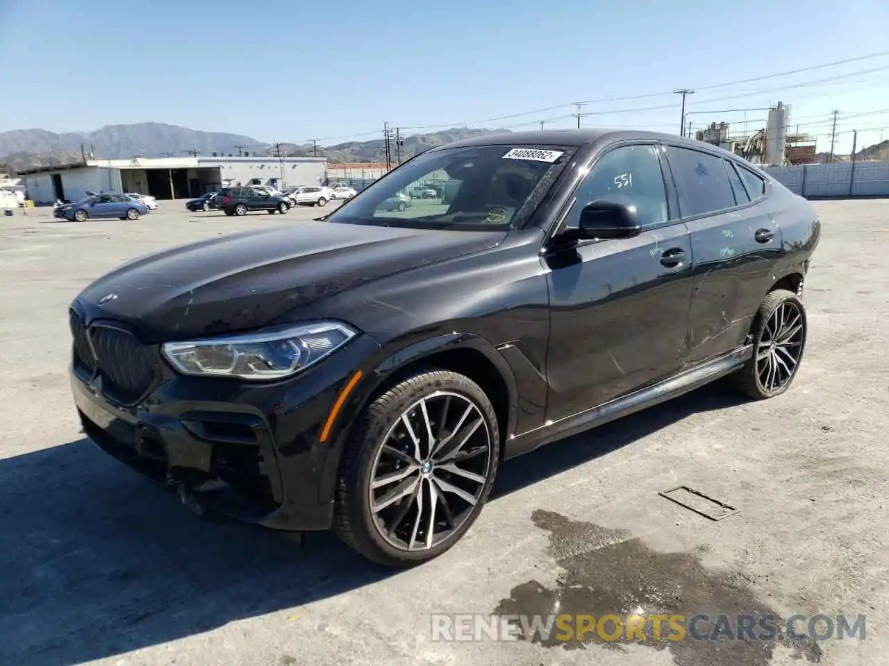 2 Photograph of a damaged car 5UXCY6C09N9K24423 BMW X6 2022