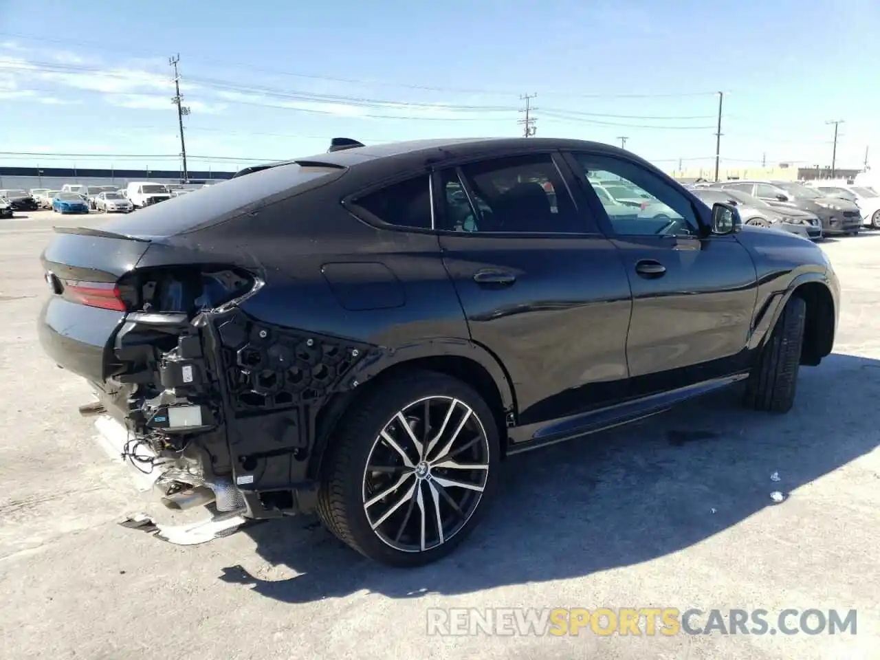 4 Photograph of a damaged car 5UXCY6C09N9K24423 BMW X6 2022