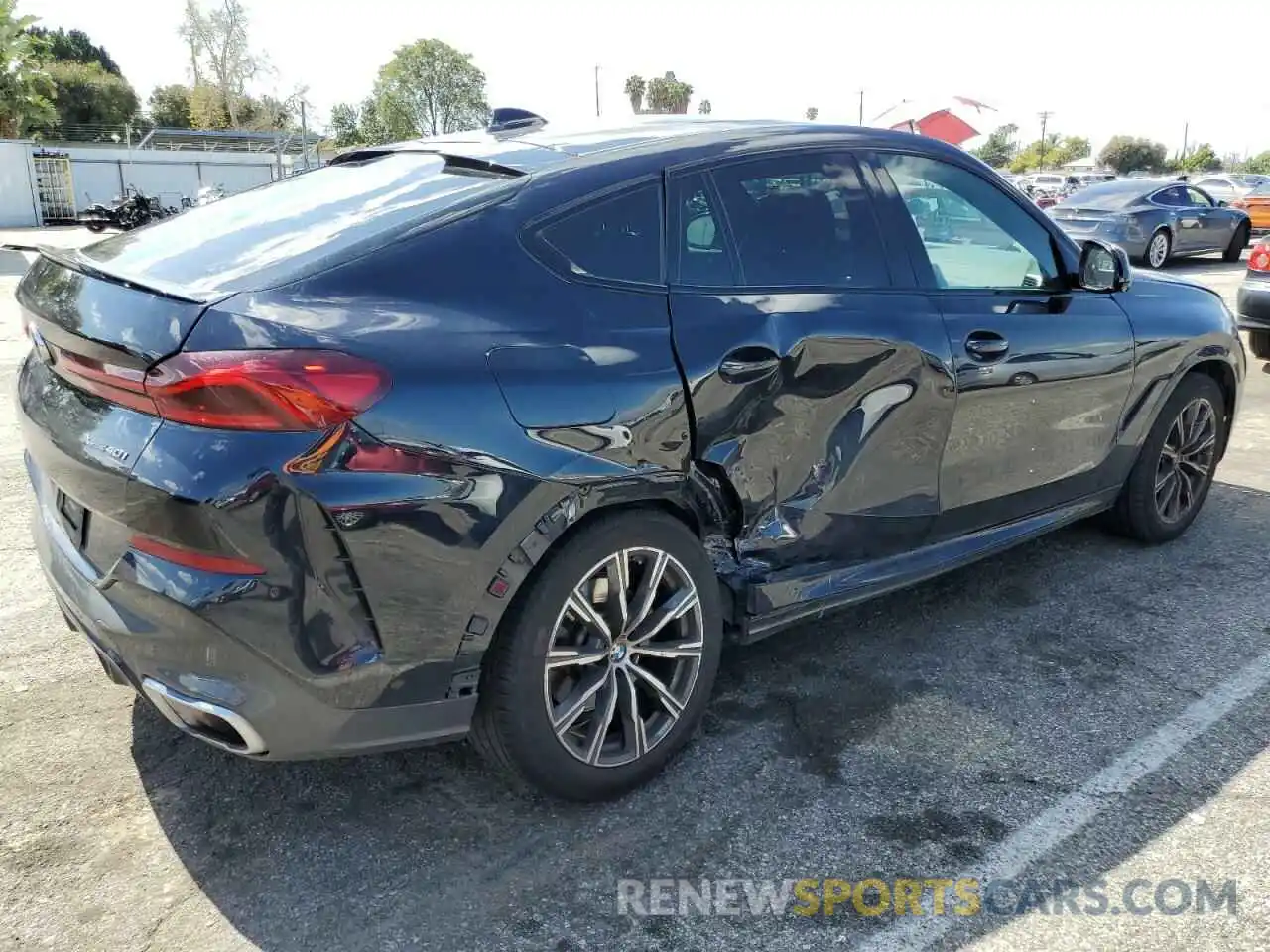 3 Photograph of a damaged car 5UXCY6C00P9P15109 BMW X6 2023