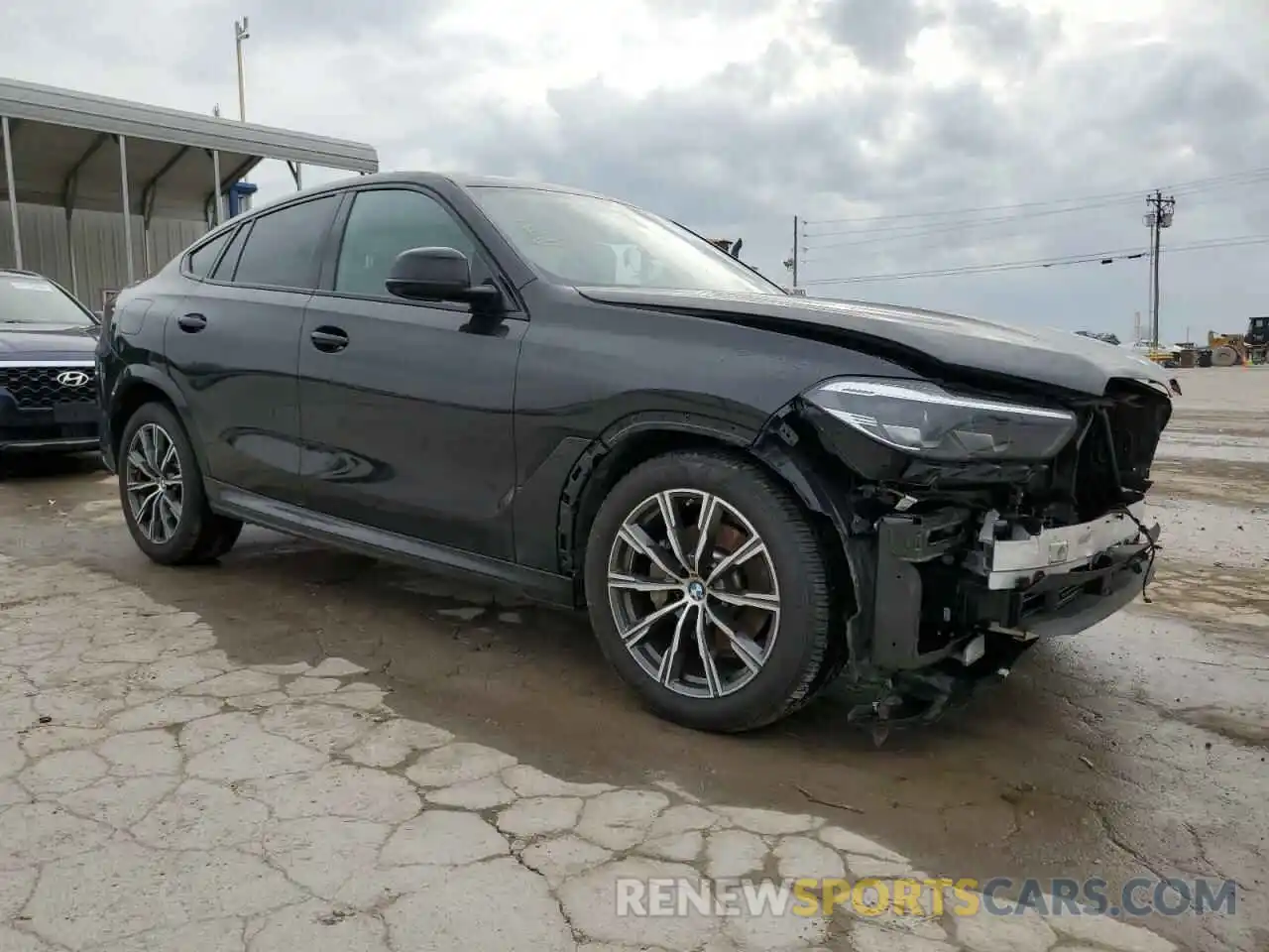 4 Photograph of a damaged car 5UXCY6C00P9S03320 BMW X6 2023