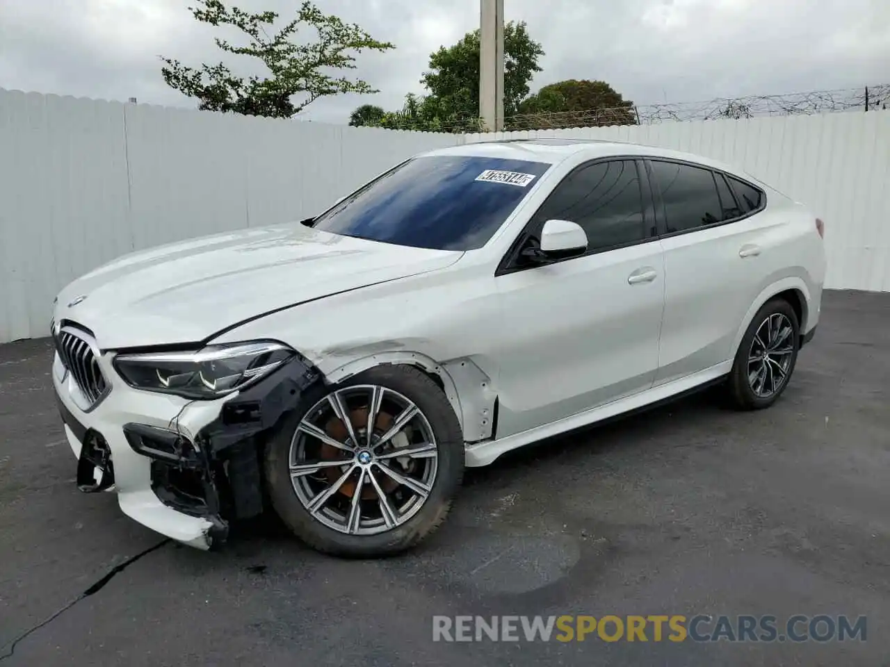 1 Photograph of a damaged car 5UXCY6C02P9P69673 BMW X6 2023