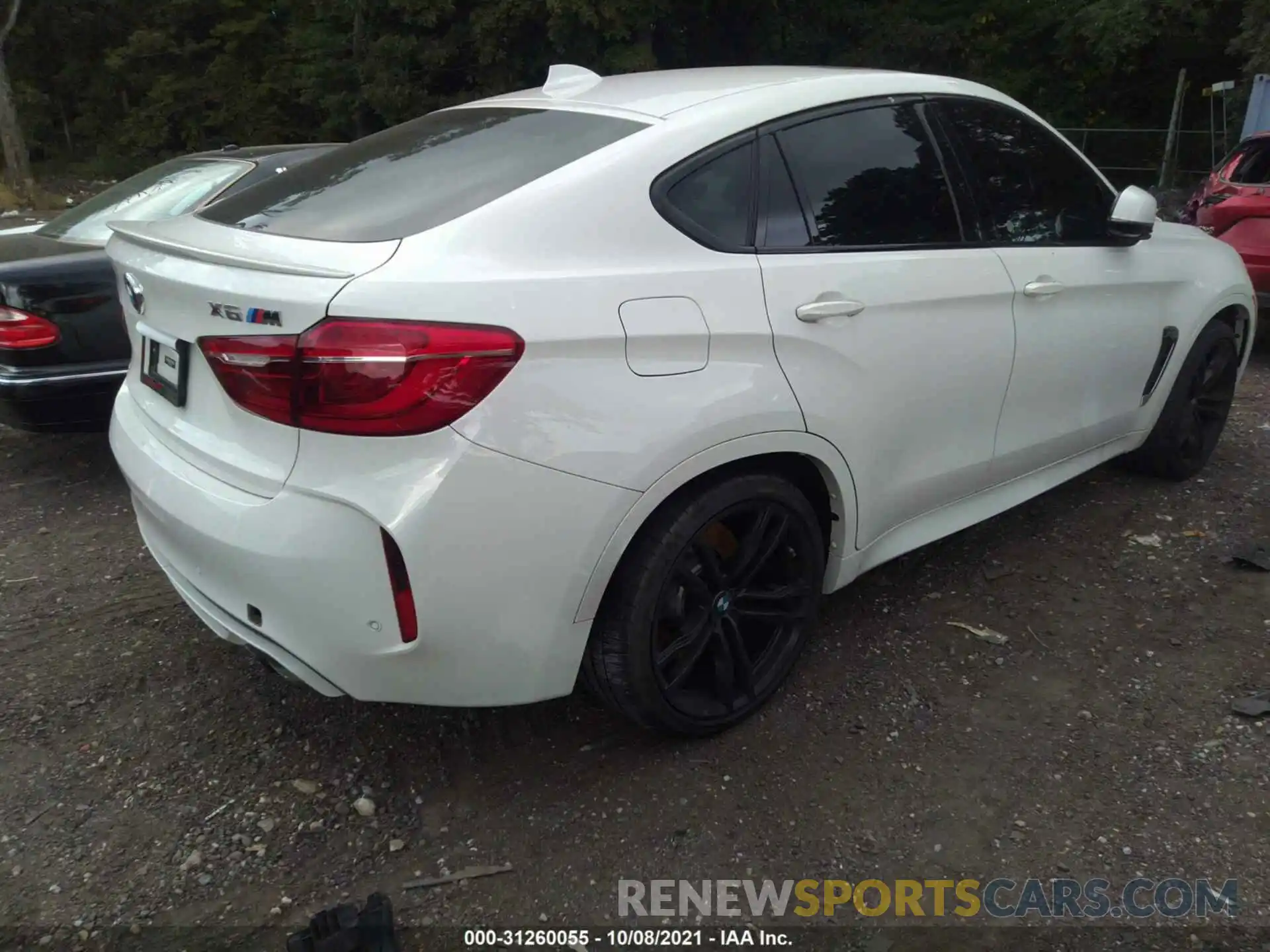 4 Photograph of a damaged car 5YMKW8C56K0Y74893 BMW X6 M 2019