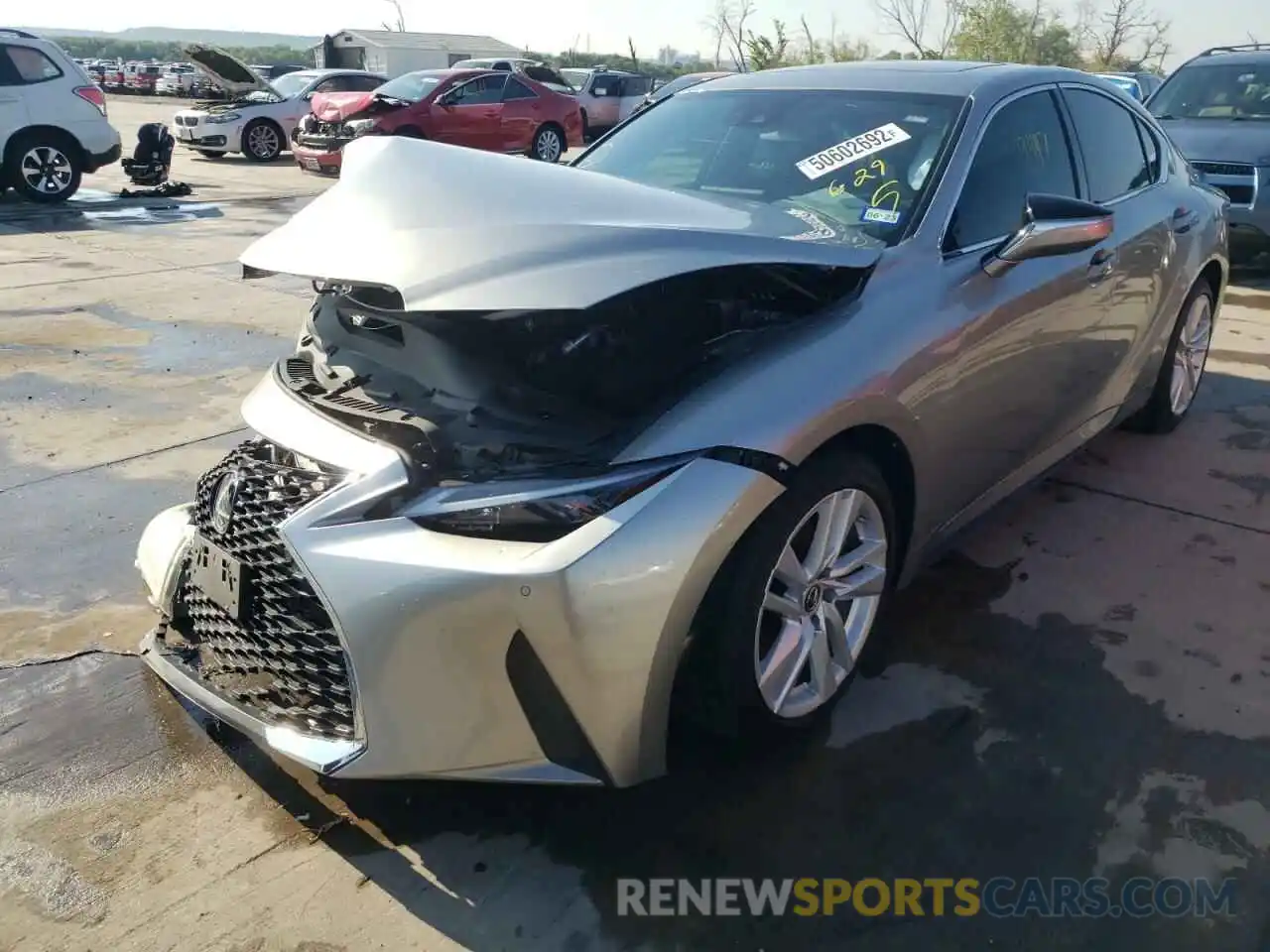 2 Photograph of a damaged car JTHCA1D20M5115636 LEXUS IS 2021