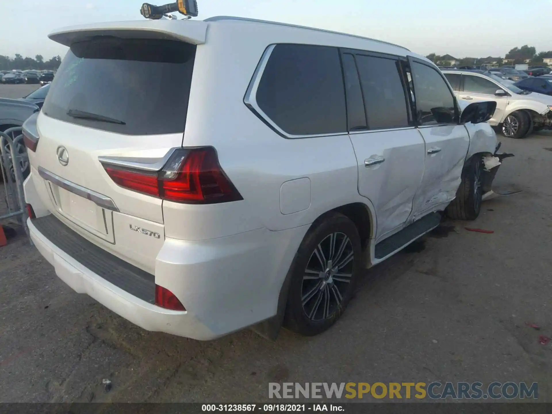 4 Photograph of a damaged car JTJFY7AX8M4334019 LEXUS LX 2021