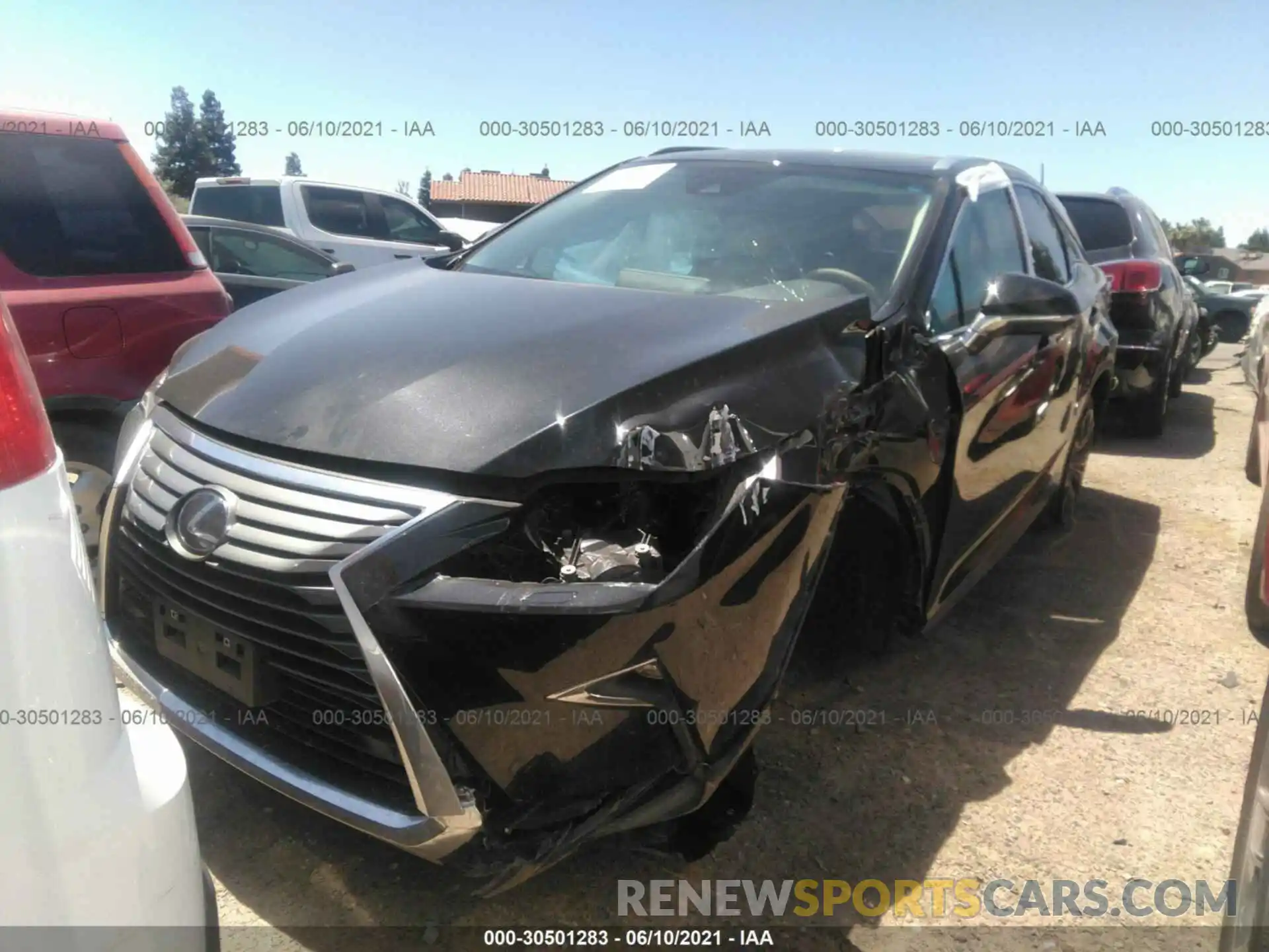 2 Photograph of a damaged car 2T2BGMCA9KC038346 LEXUS RX 2019