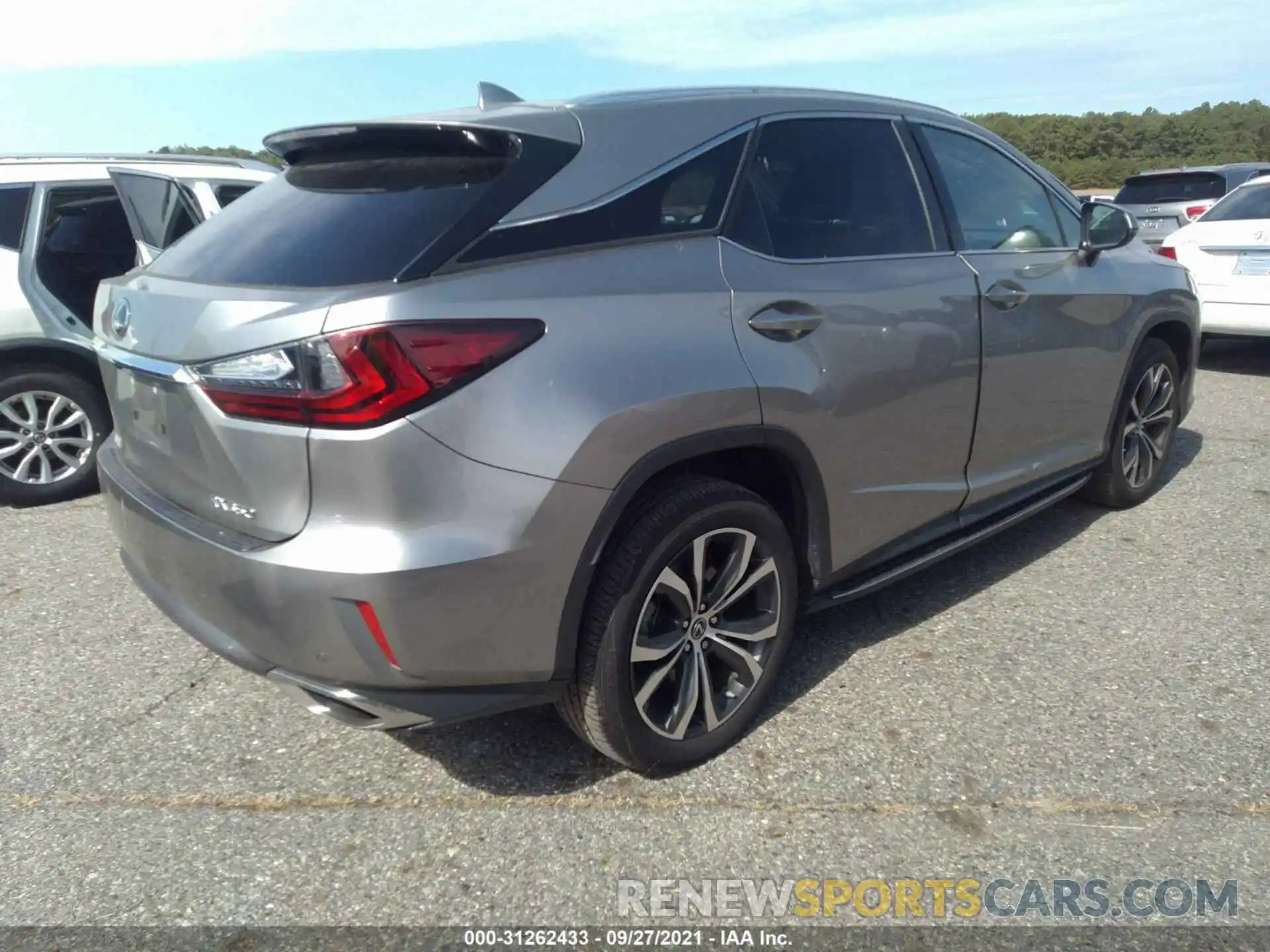 4 Photograph of a damaged car 2T2BZMCA0KC179431 LEXUS RX 2019