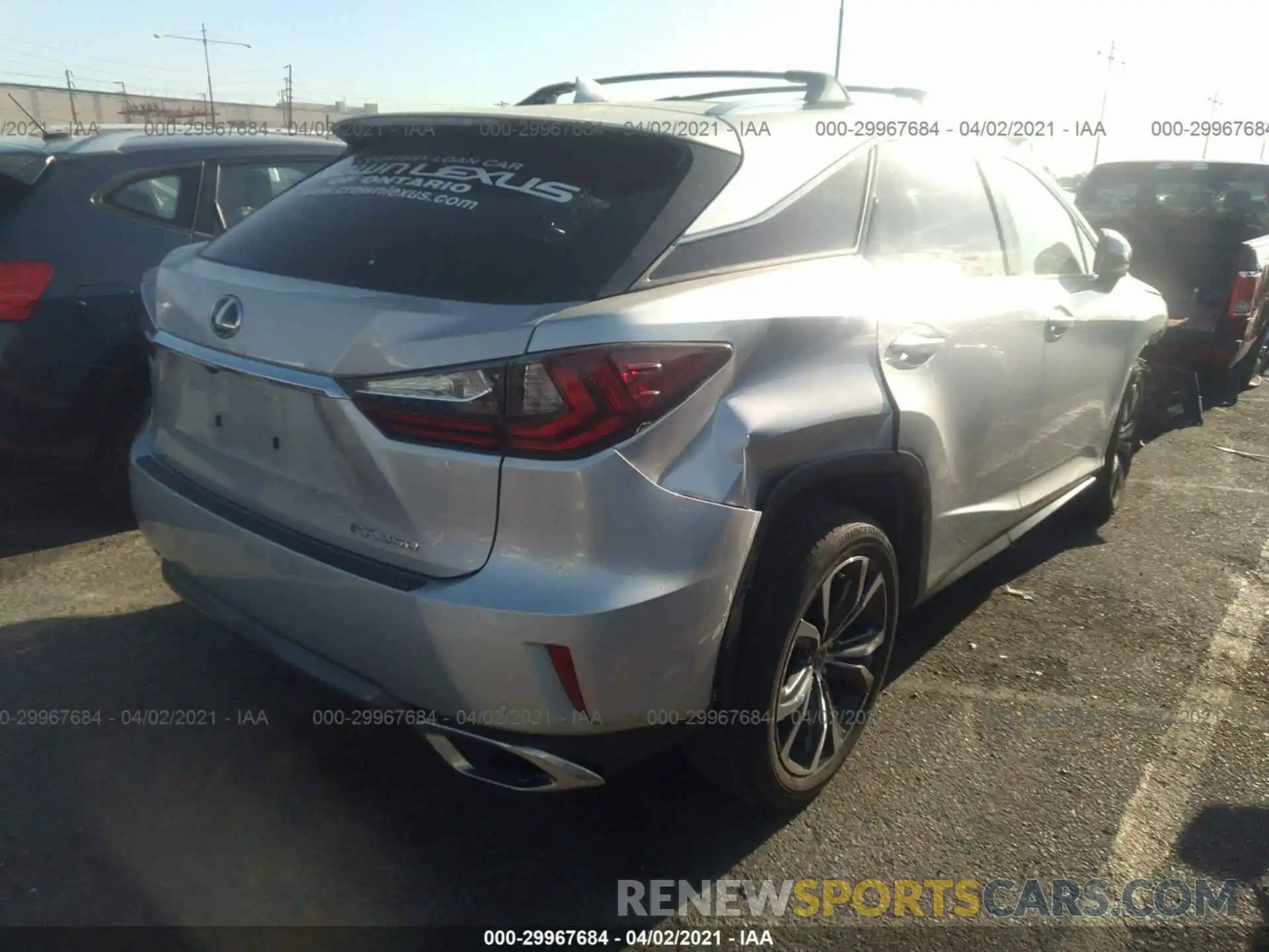 4 Photograph of a damaged car 2T2ZZMCA2KC135882 LEXUS RX 2019