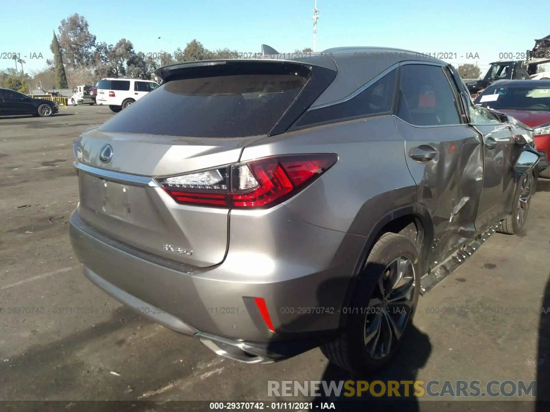 4 Photograph of a damaged car 2T2ZZMCA2KC139463 LEXUS RX 2019