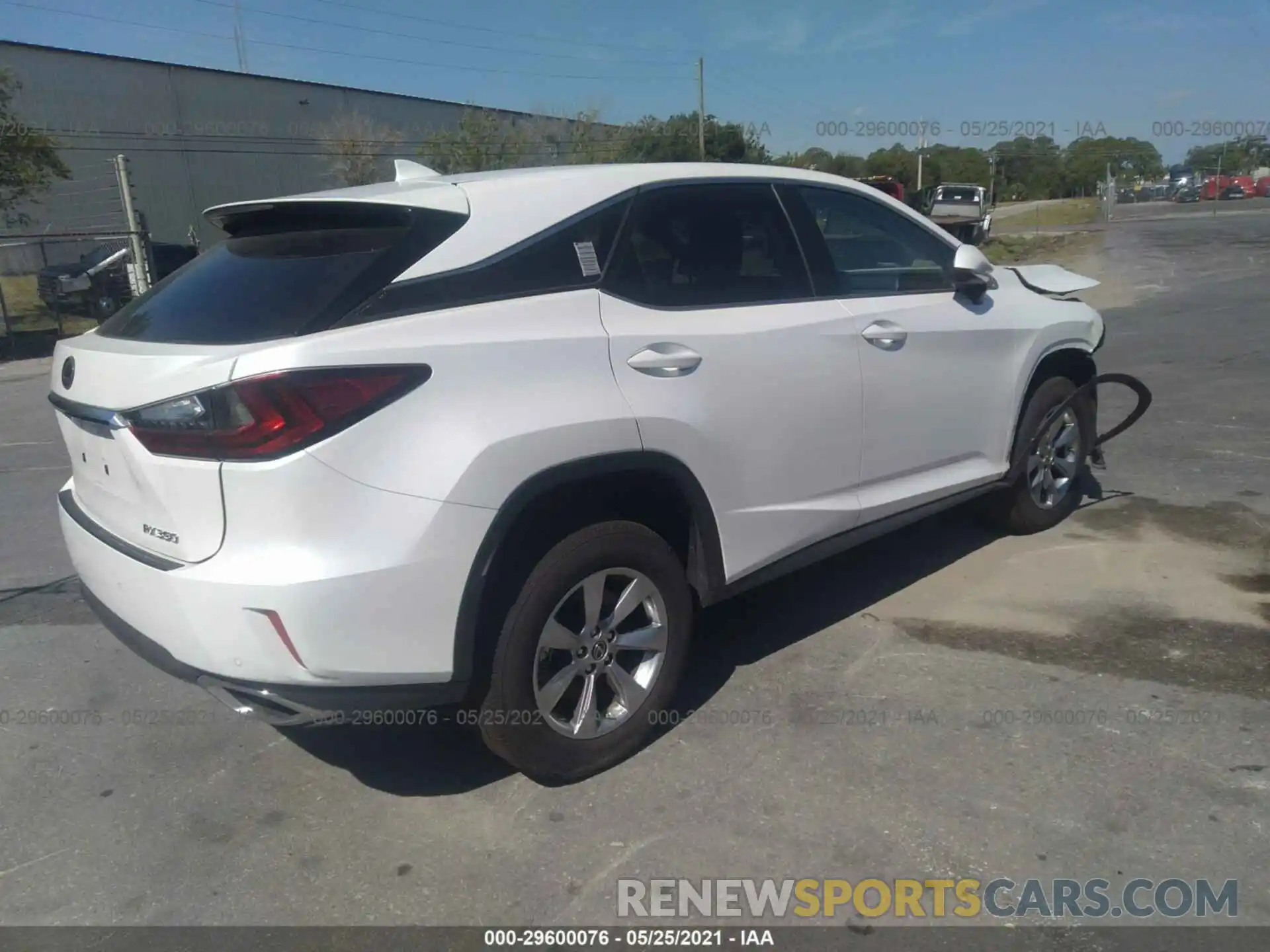 4 Photograph of a damaged car 2T2ZZMCA2KC143156 LEXUS RX 2019