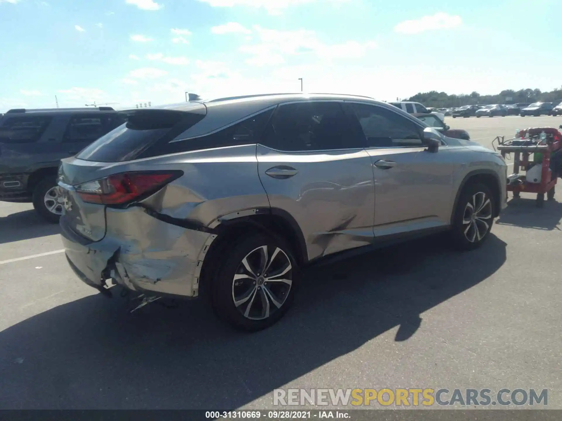 4 Photograph of a damaged car 2T2ZZMCA2KC145313 LEXUS RX 2019