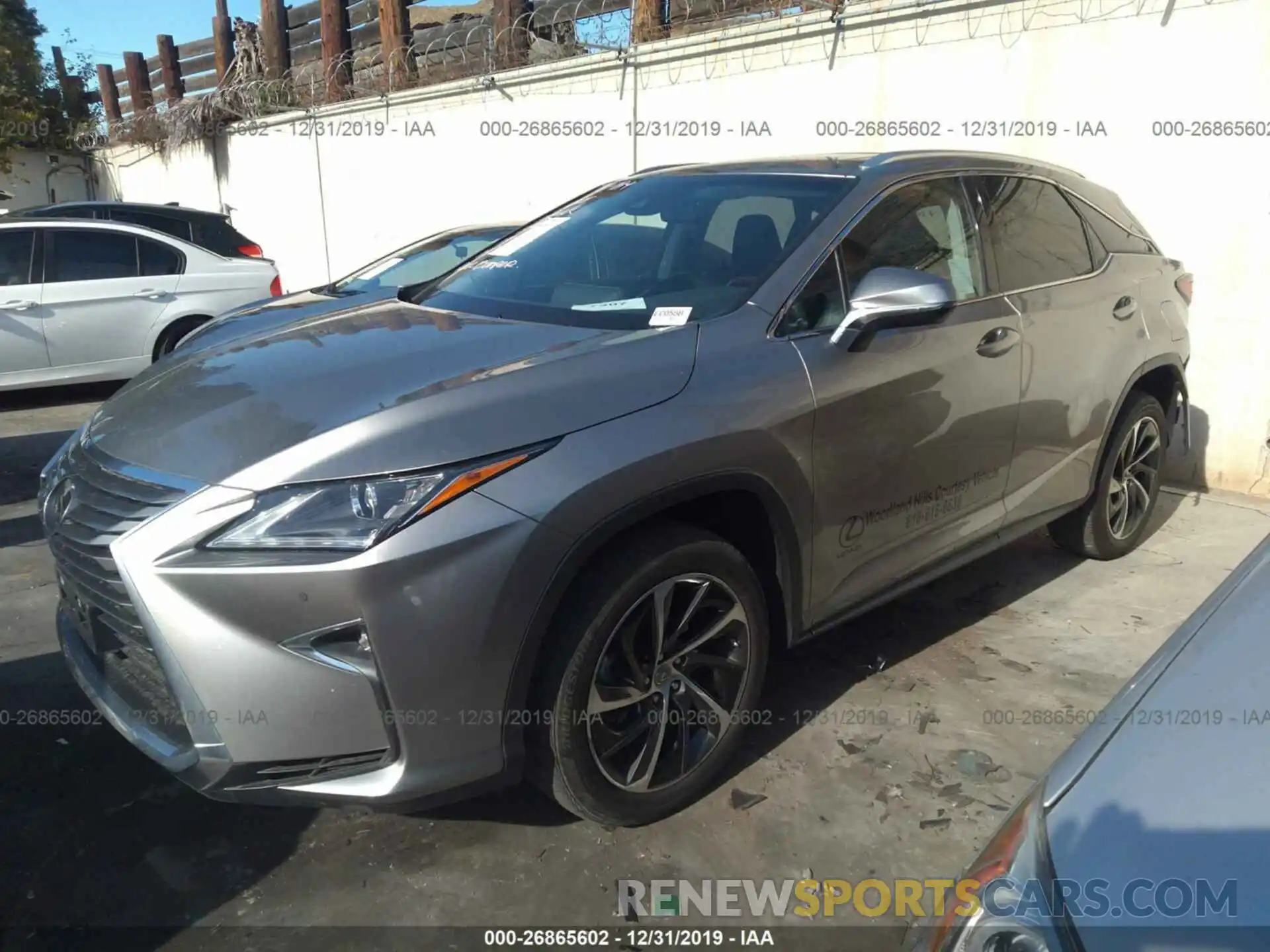 2 Photograph of a damaged car 2T2ZZMCA3KC138368 LEXUS RX 2019