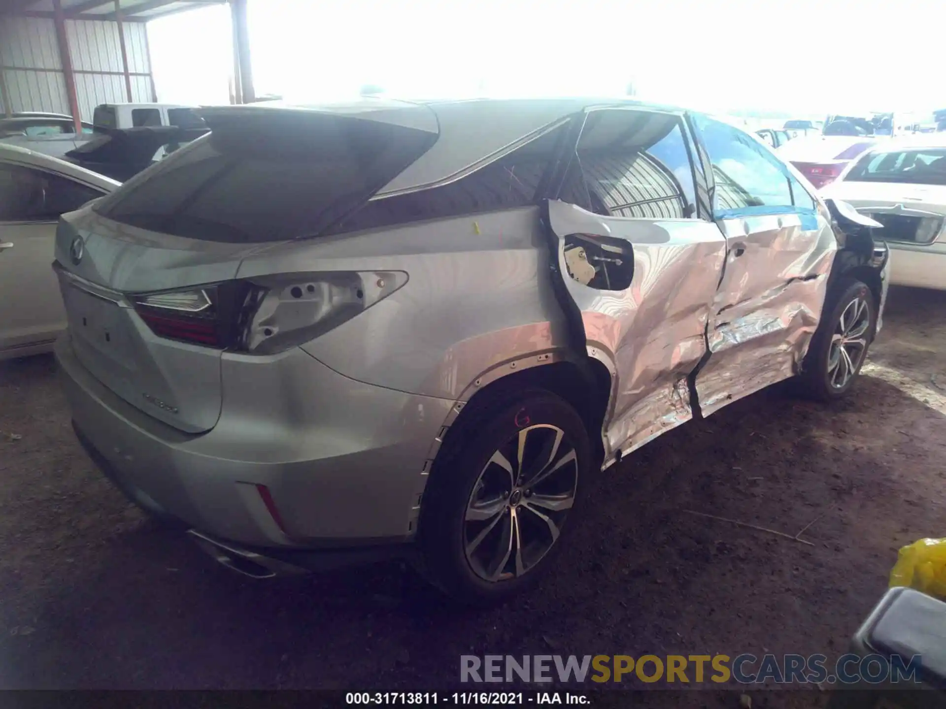 4 Photograph of a damaged car 2T2ZZMCA4KC122311 LEXUS RX 2019