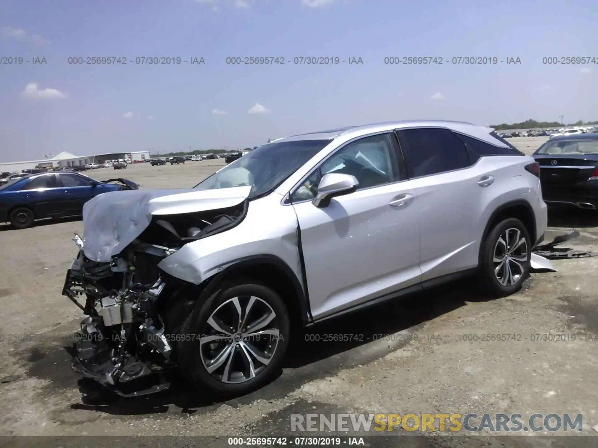 2 Photograph of a damaged car 2T2ZZMCA5KC125489 LEXUS RX 2019