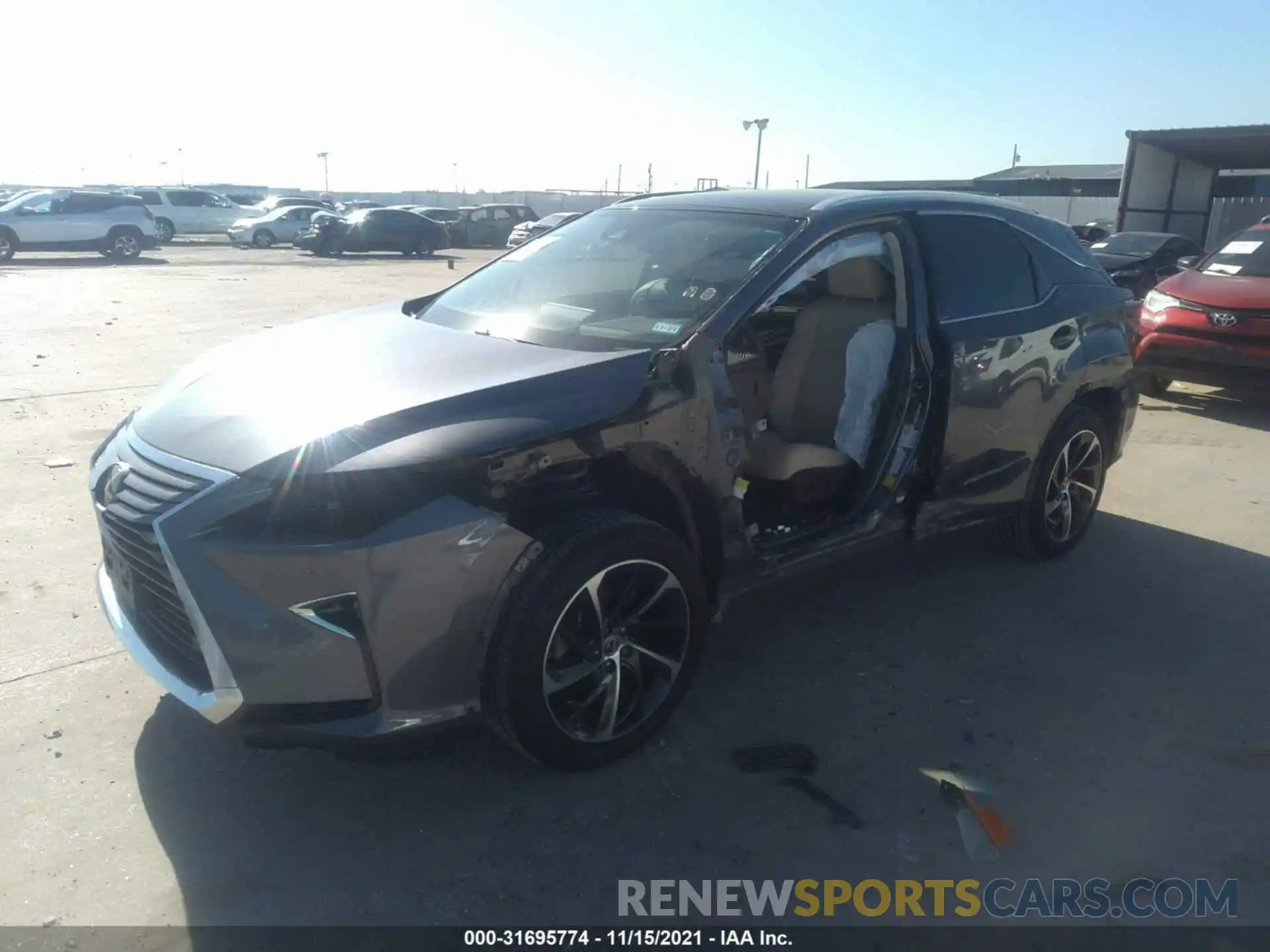 2 Photograph of a damaged car 2T2ZZMCA6KC125677 LEXUS RX 2019