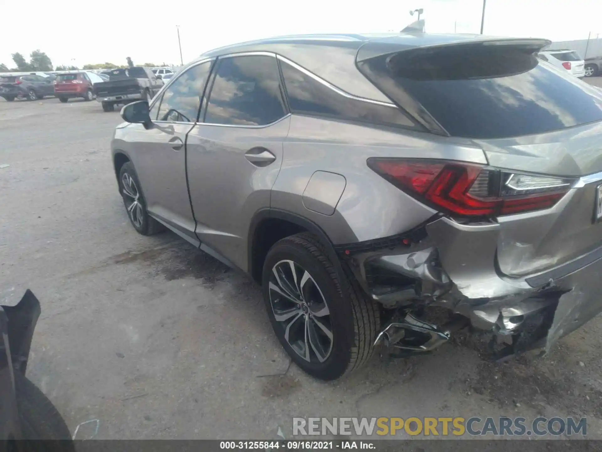 3 Photograph of a damaged car 2T2ZZMCA6KC142074 LEXUS RX 2019