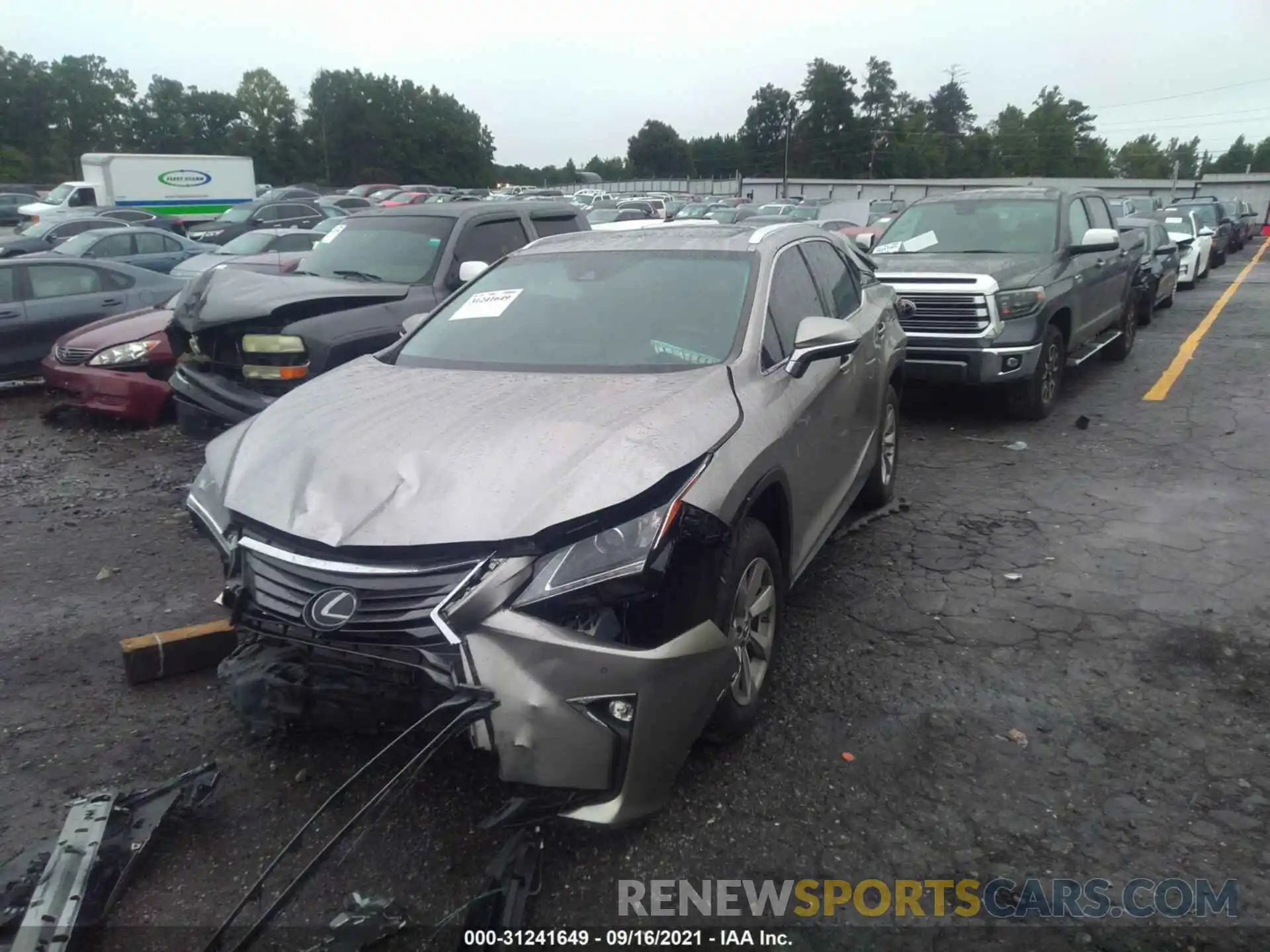 2 Photograph of a damaged car 2T2ZZMCA9KC139136 LEXUS RX 2019