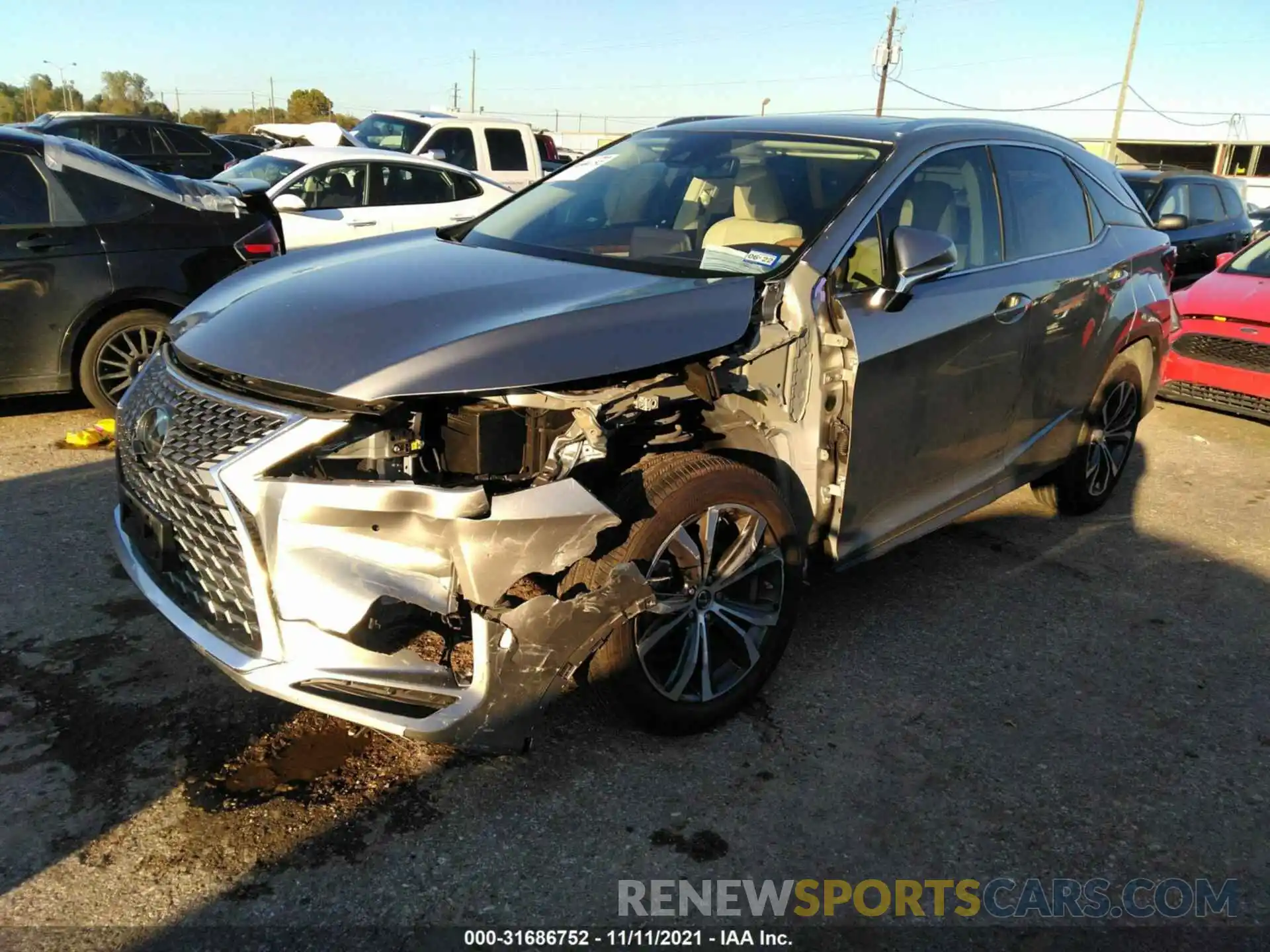 2 Photograph of a damaged car 2T2HZMAA4LC173291 LEXUS RX 2020