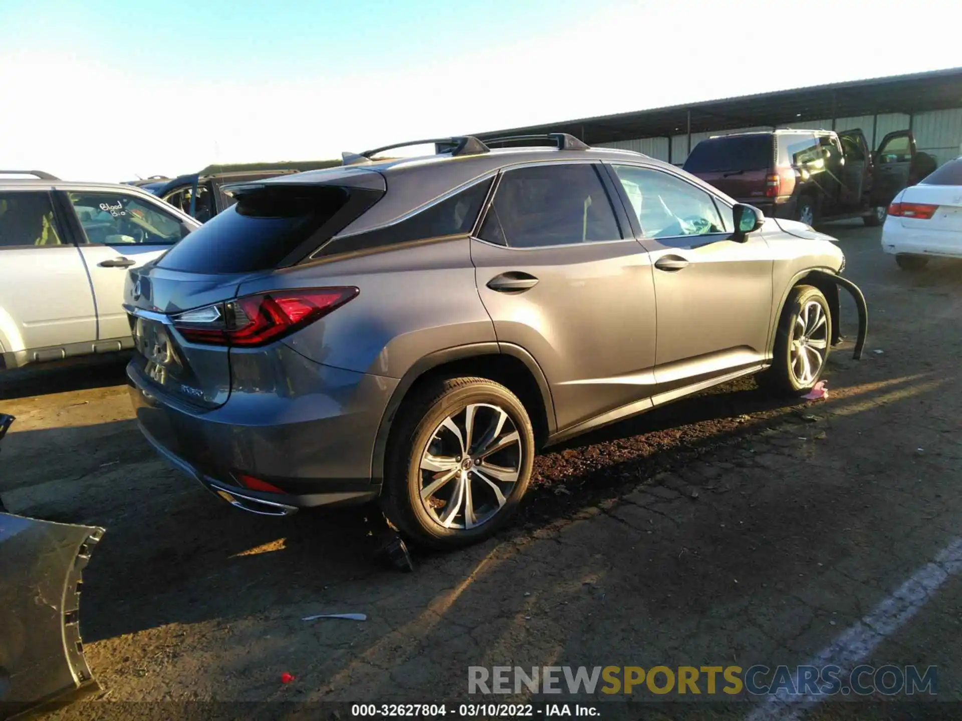 4 Photograph of a damaged car 2T2HZMDA2LC233628 LEXUS RX 2020