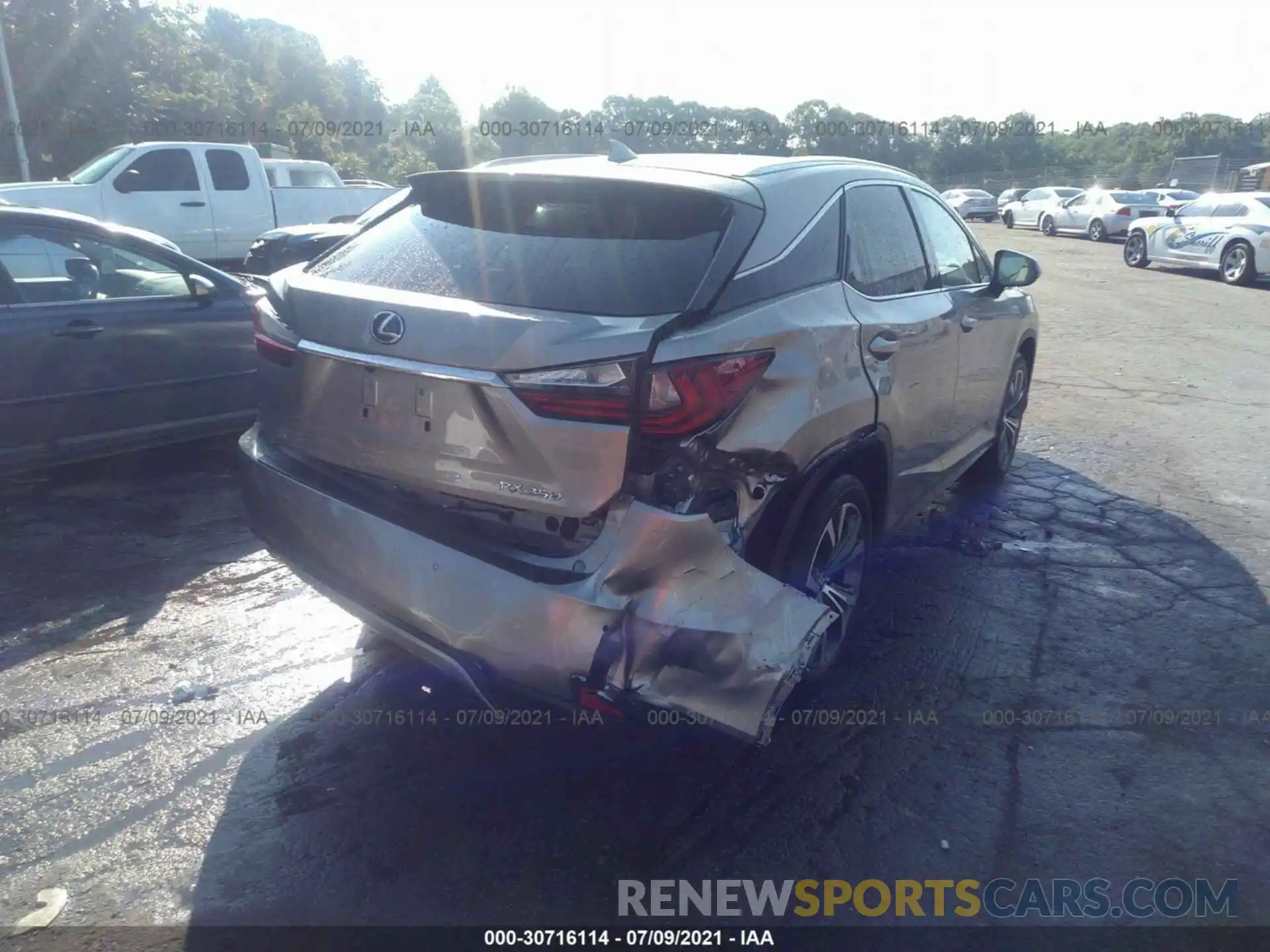 4 Photograph of a damaged car 2T2HZMDA5LC219724 LEXUS RX 2020