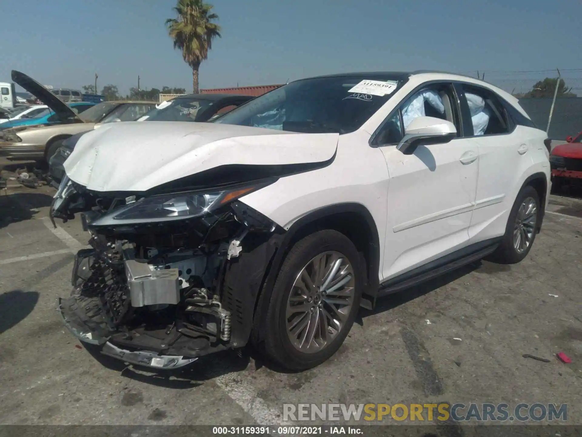 2 Photograph of a damaged car 2T2JZMAA0LC151855 LEXUS RX 2020