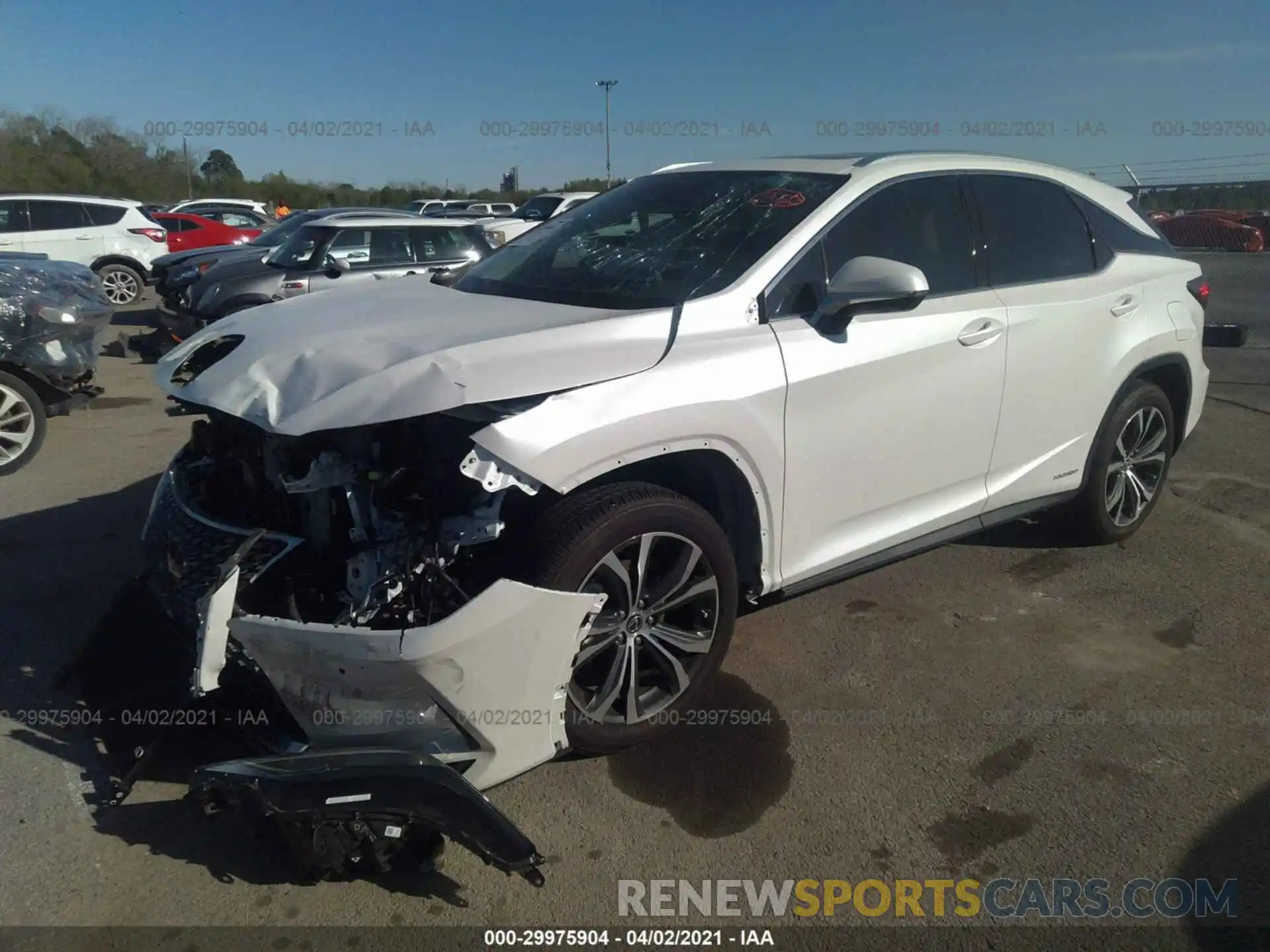 2 Photograph of a damaged car 2T2HGMDA2MC057381 LEXUS RX 2021