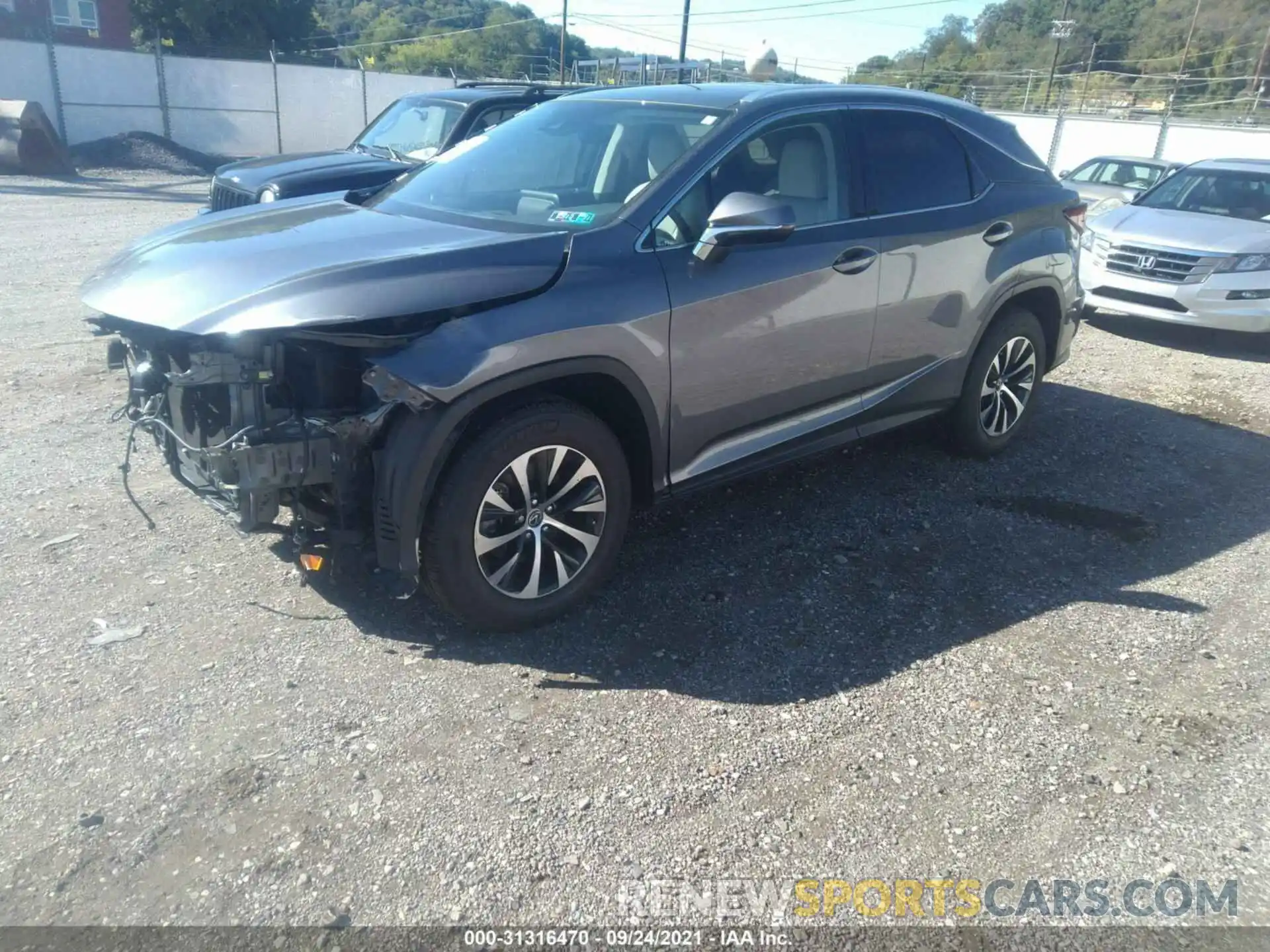 2 Photograph of a damaged car 2T2HZMDA3MC260144 LEXUS RX 2021