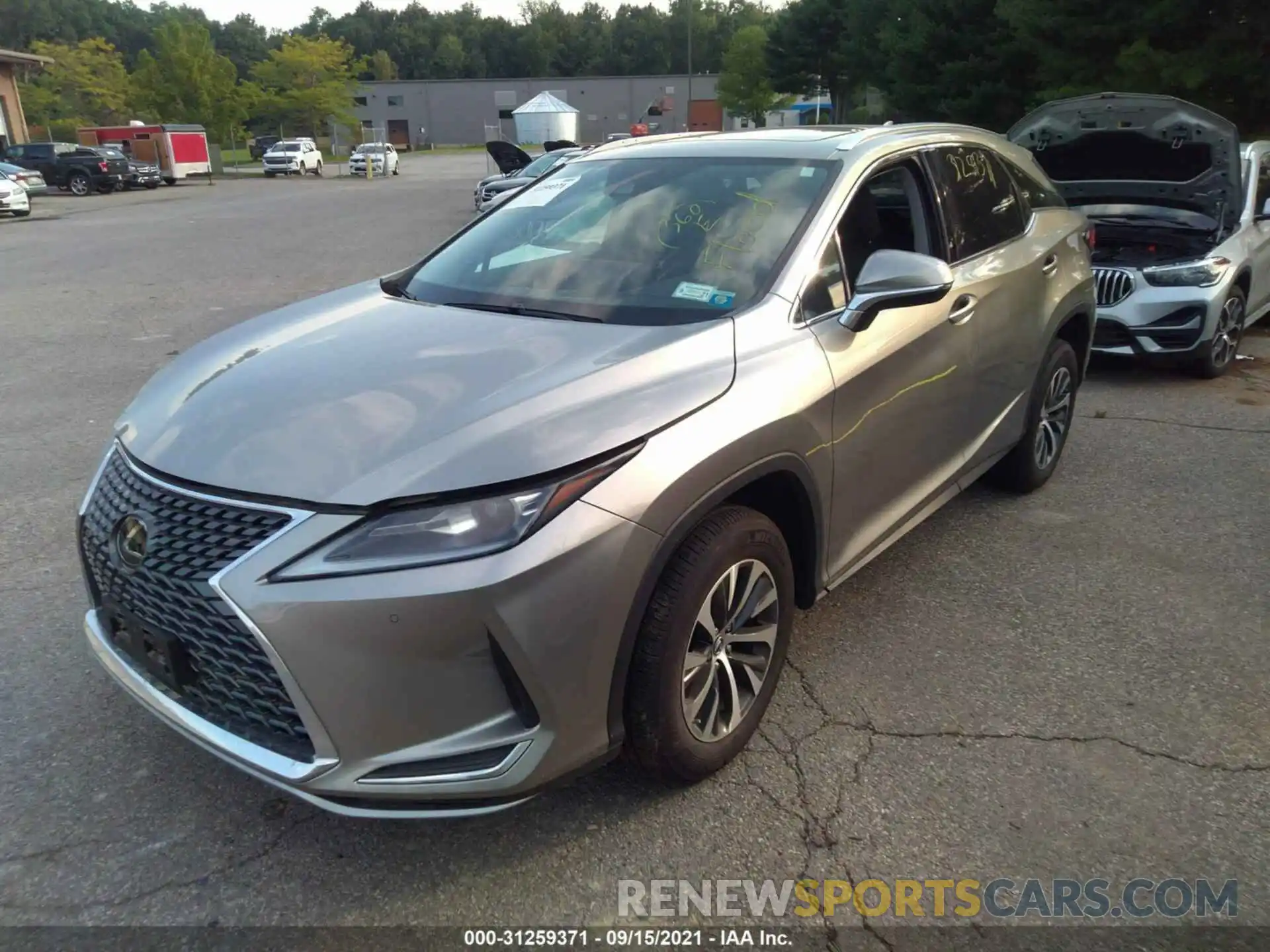 2 Photograph of a damaged car 2T2HZMDA9MC267468 LEXUS RX 2021