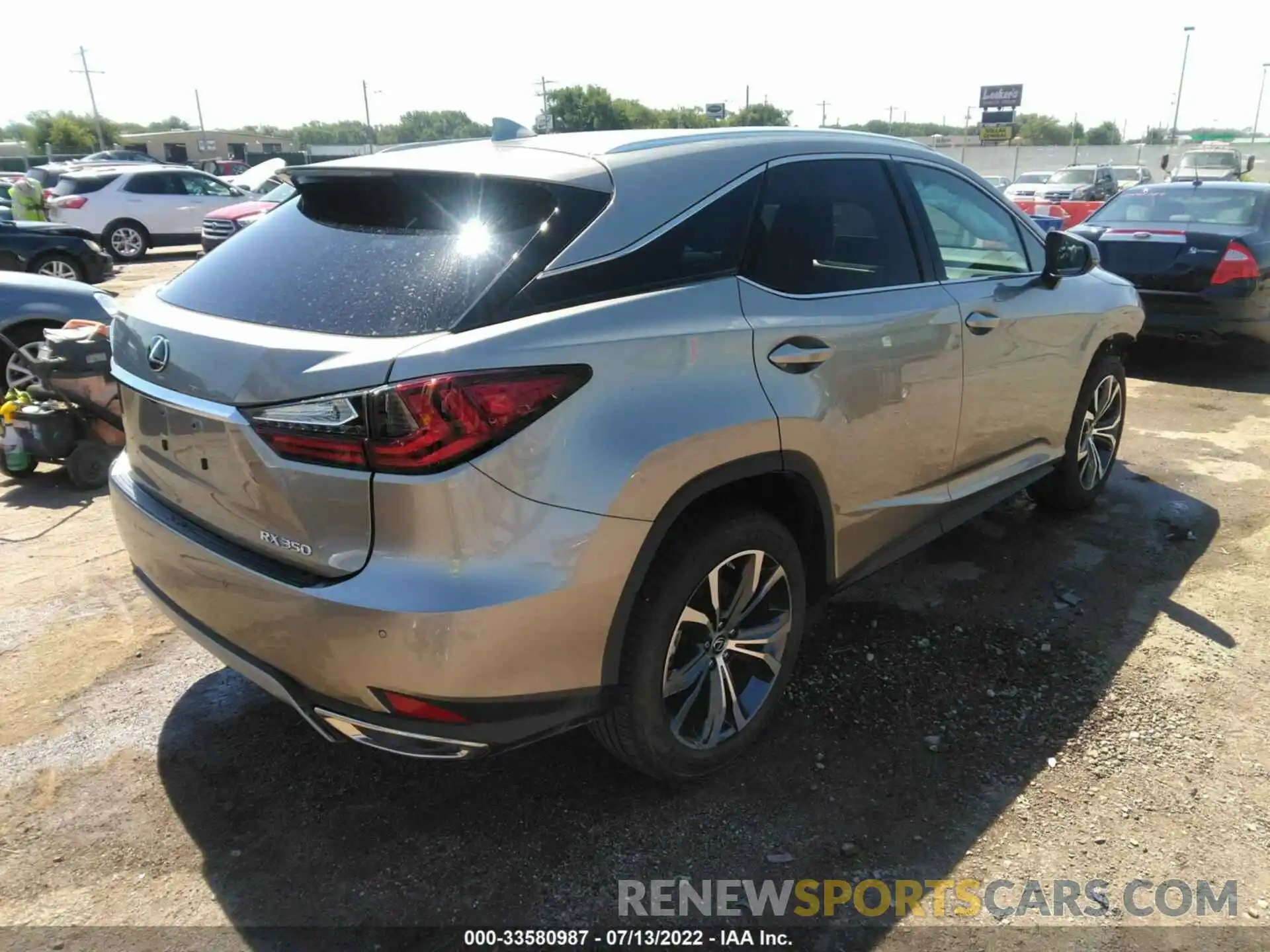 4 Photograph of a damaged car 2T2HZMDA4NC348038 LEXUS RX 2022