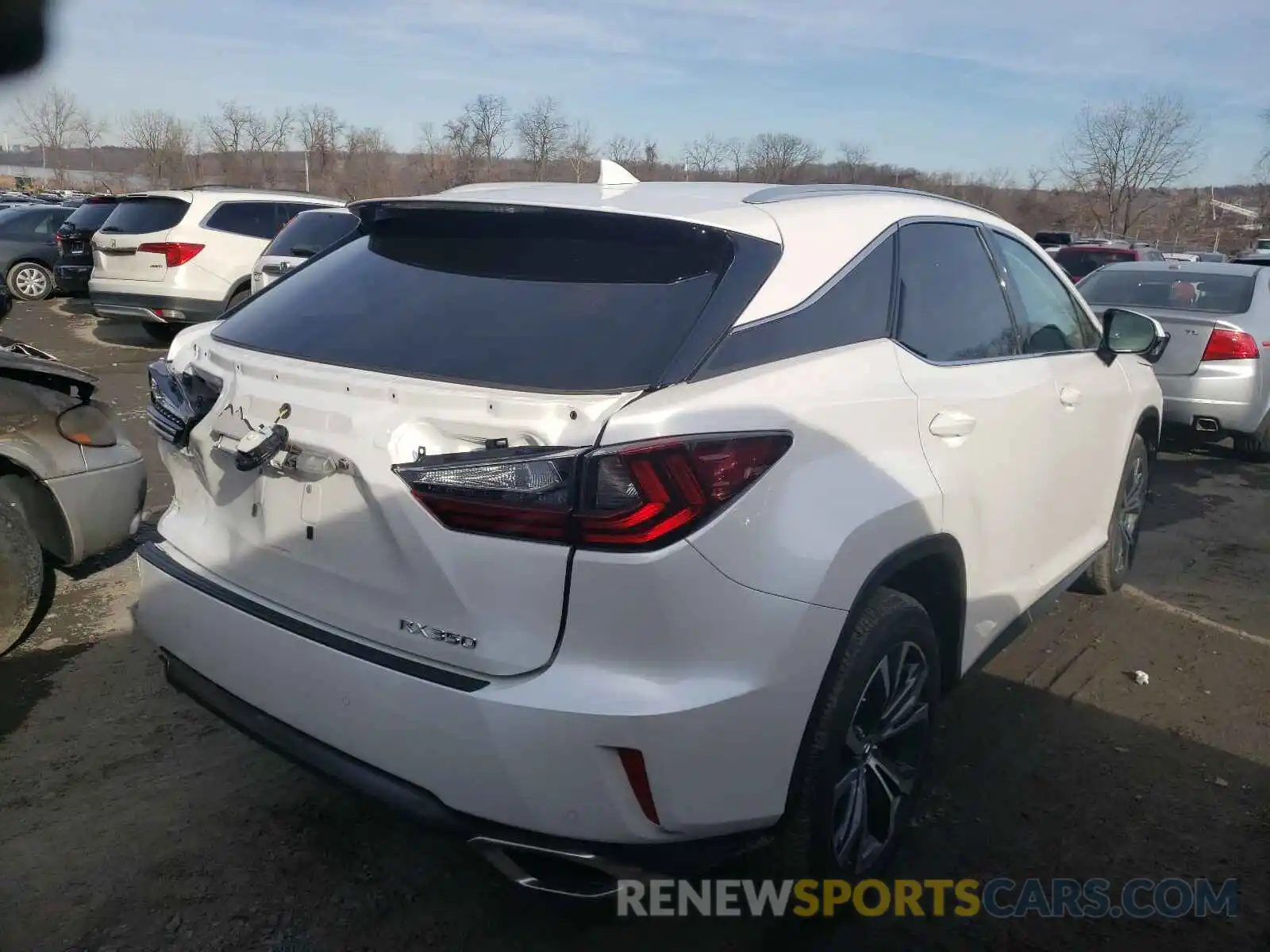 4 Photograph of a damaged car 2T2BZMCA2KC185652 LEXUS RX 350 BAS 2019