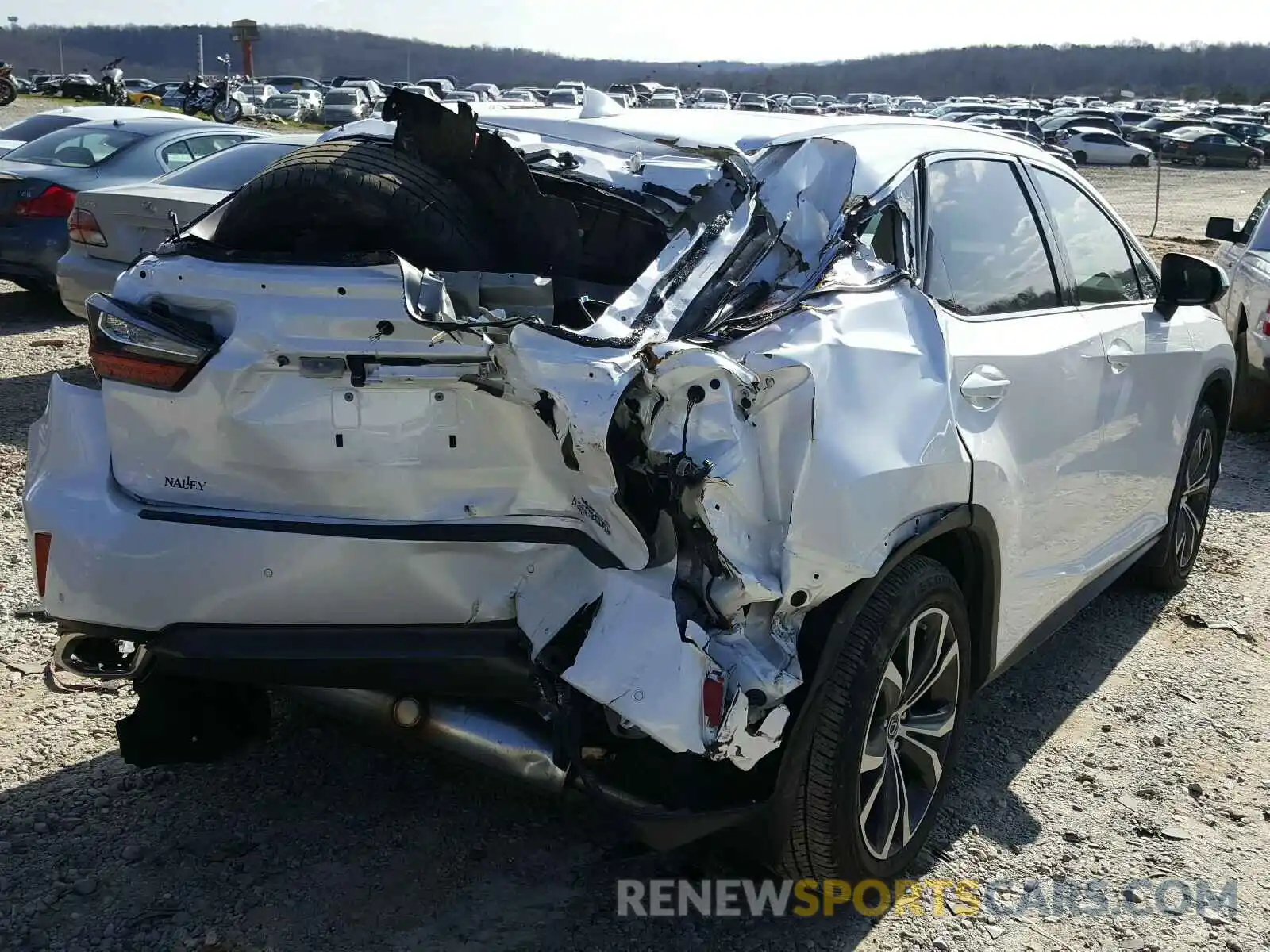 4 Photograph of a damaged car 2T2ZZMCA2KC139415 LEXUS RX 350 BAS 2019